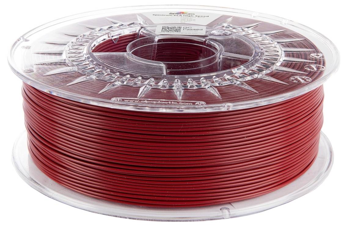 Eine Spule rotes 3D-Druckfilament, ordentlich aufgewickelt. Die Spule ist transparent und zeigt die Farbe und Textur des Filaments.