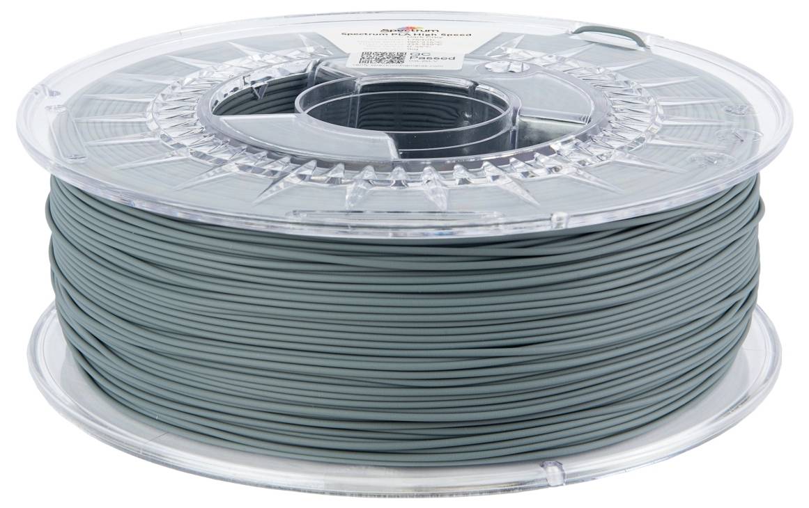 Eine Spule dunklen grünen Filaments für den 3D-Druck, eingehüllt in einer transparenten Kunststoffverpackung.