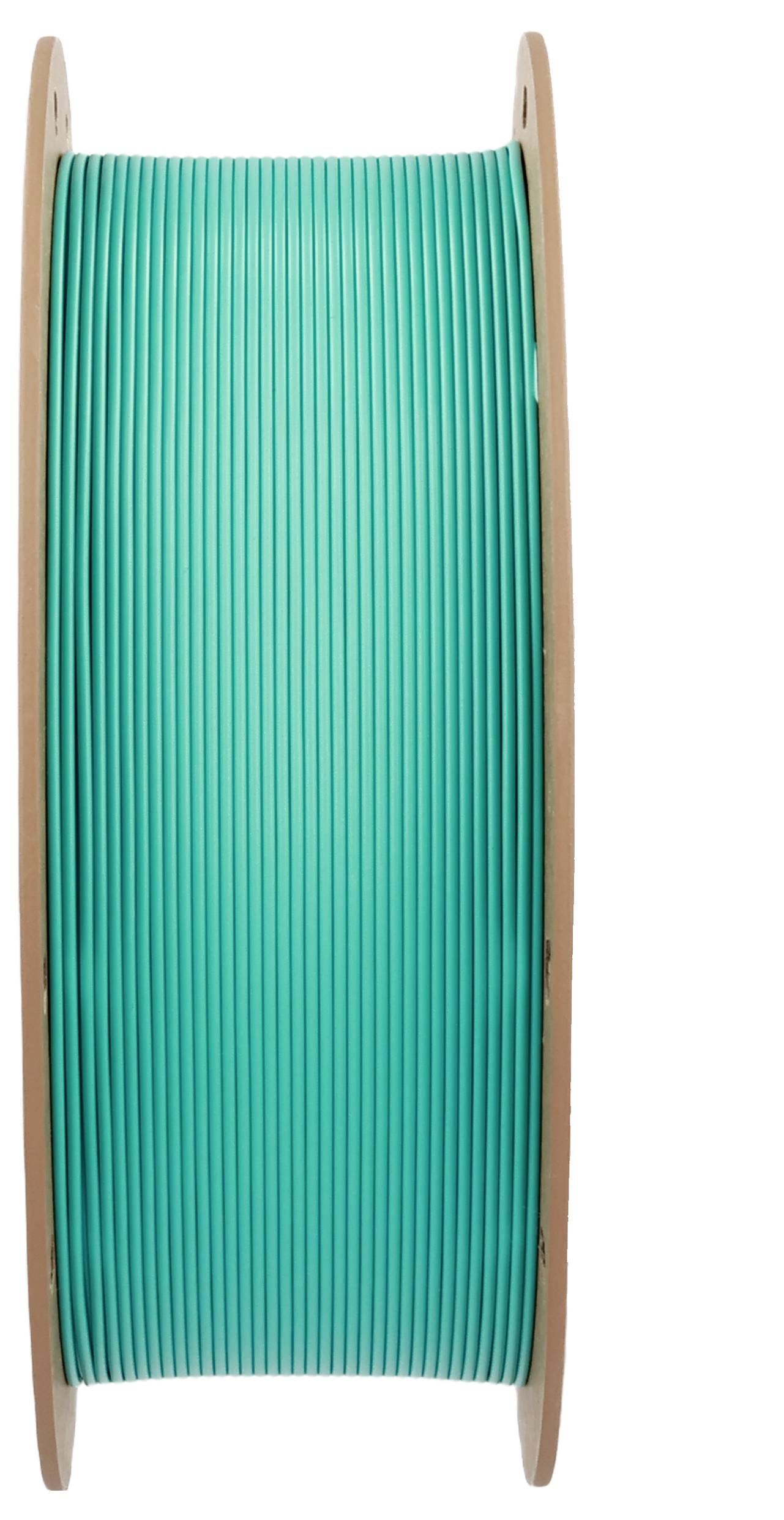 Eine große Spule grüner Filament, wahrscheinlich für 3D-Druck verwendet, mit hölzernen Seitenpaneelen.