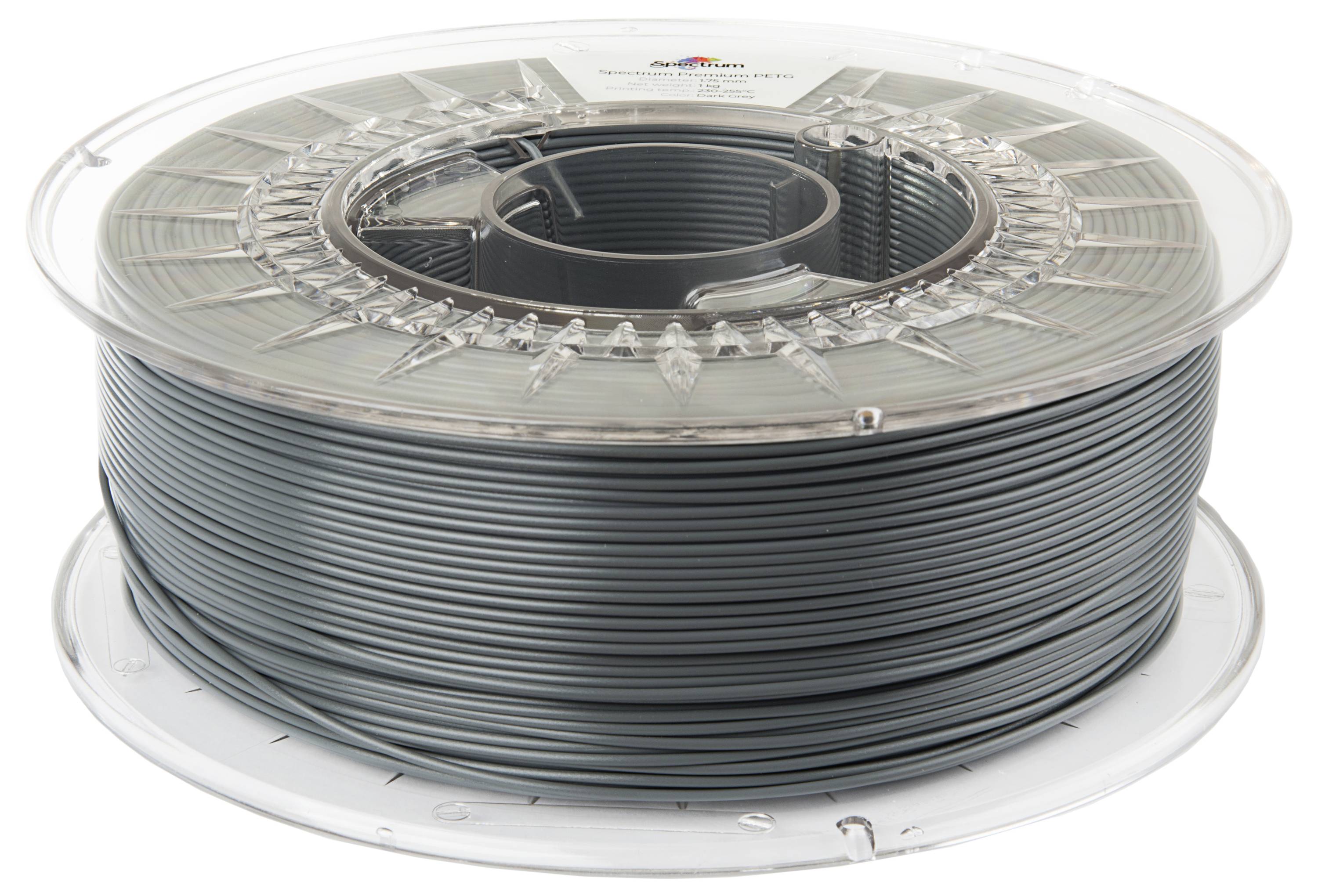 Eine Spule grauen 3D-Druckerfilaments auf einer durchsichtigen Plastikrolle, die eng gewickelte Filamentspulen zeigt.