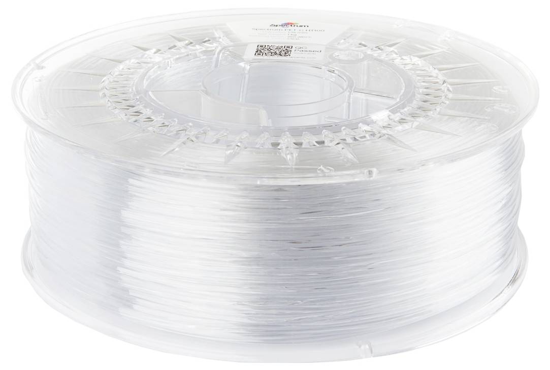 Eine klare Spule aus transparentem 3D-Druckfilament, sauber aufgewickelt, mit einem Etikett auf der Oberseite.