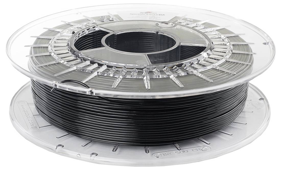 Eine Spule schwarzen 3D-Druckerfilaments auf einer transparenten Kunststoffrolle, verwendet für additive Fertigungsverfahren.