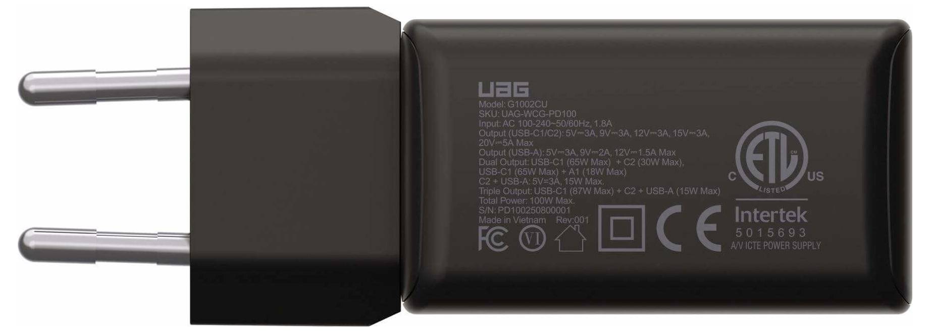 Ein zweipronger europäischer USB-Wandladegerät mit 'UAG'-Branding und Zertifizierungsmarkierungen, einschließlich ETL- und CE-Logos, wird präsentiert.