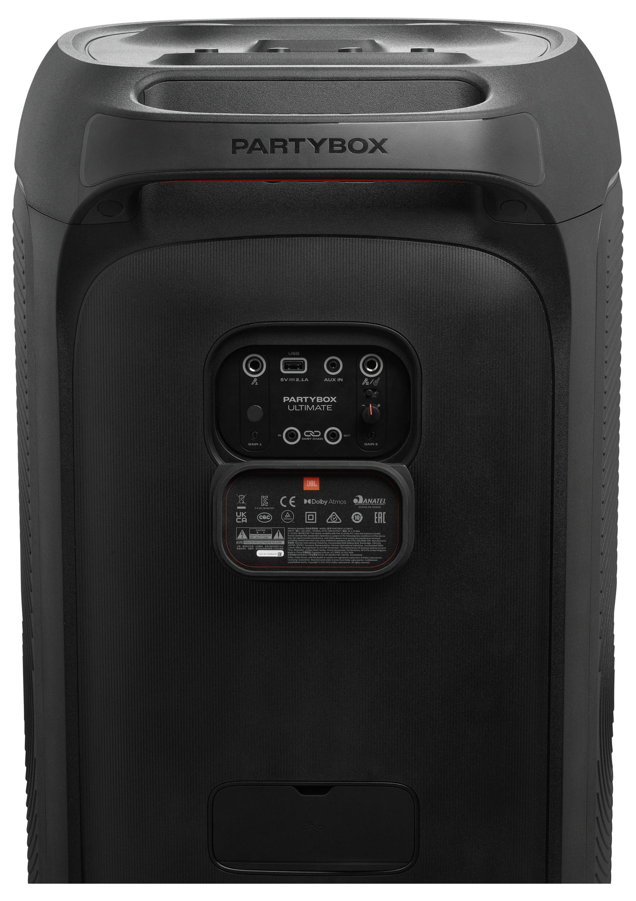 Ein großer schwarzer Party-Lautsprecher mit mehreren Eingangsbuchsen und Steuerungstasten, auf dessen Oberseite 