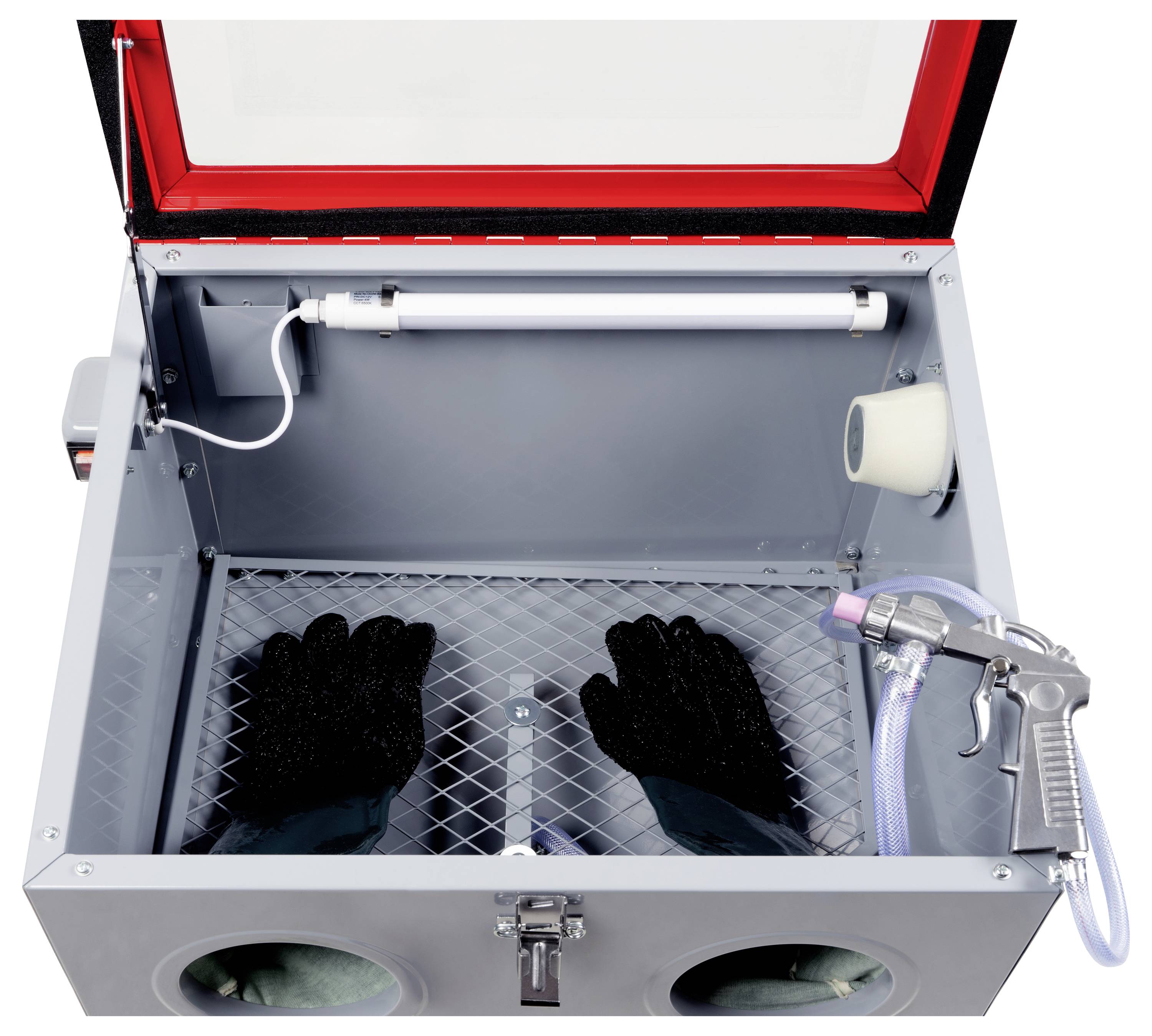 Ein grauer Sandstrahlschrank mit roten Kanten, Gitteroberfläche, Luftdüse, Leuchtstofflampe und schwarzen Handschuhen, die in den Schrank hineingreifen.