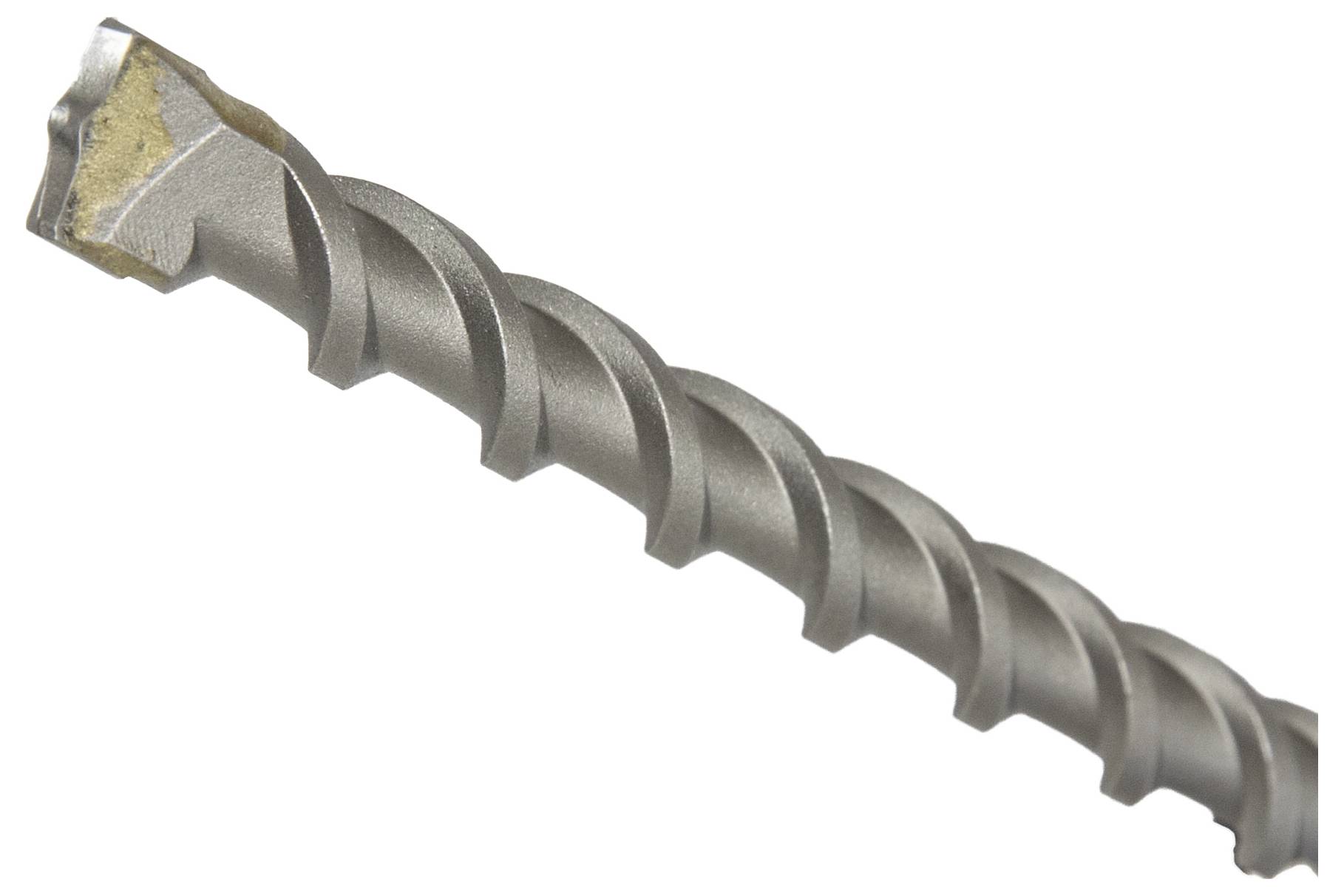 Ein Nahaufnahmefoto eines Metallbohrers mit einer Spiralnut und einer scharfen Spitze, der zum Bohren in harte Materialien verwendet wird.