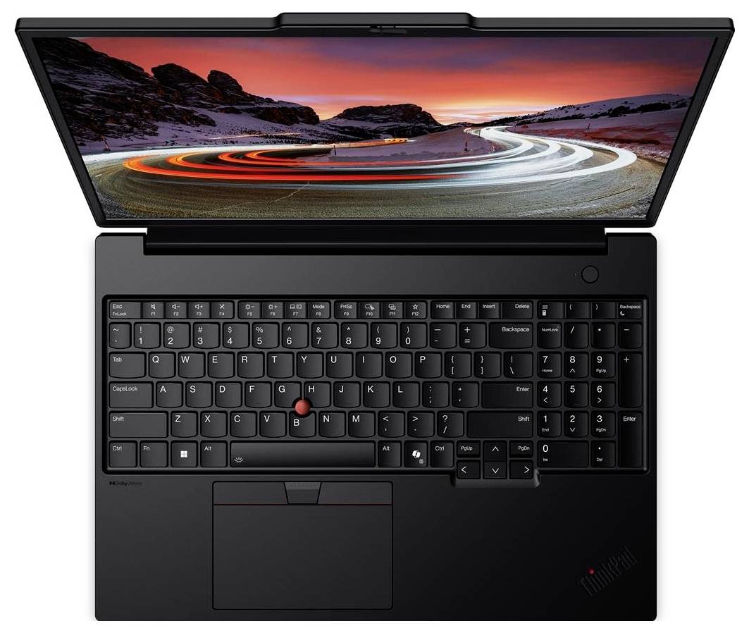 Ein schwarzer Laptop mit geöffnetem Bildschirm, der eine malerische Aussicht einer sich windenden Straße bei Sonnenuntergang zeigt. Die Tastatur verfügt über einen Trackpoint in der Mitte.