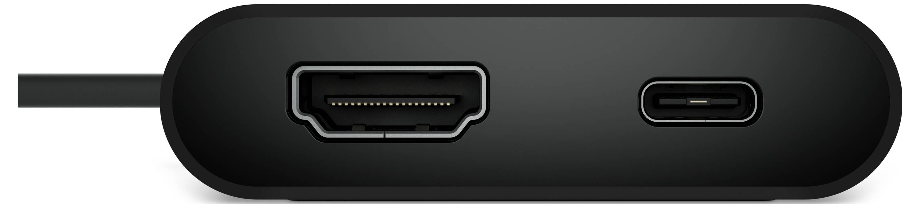 Eine Nahaufnahme eines schwarzen elektronischen Geräts mit einem HDMI-Anschluss auf der linken und einem USB-C-Anschluss auf der rechten Seite.