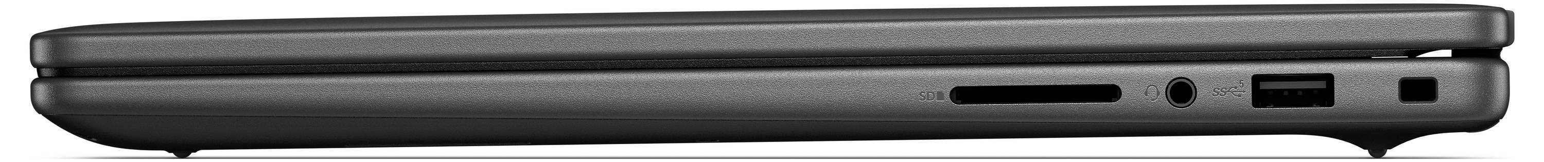 Ein geschlossener schwarzer Laptop, von der Seite betrachtet, der verschiedene Anschlüsse wie USB und Kopfhörerbuchse auf der rechten Seite zeigt.