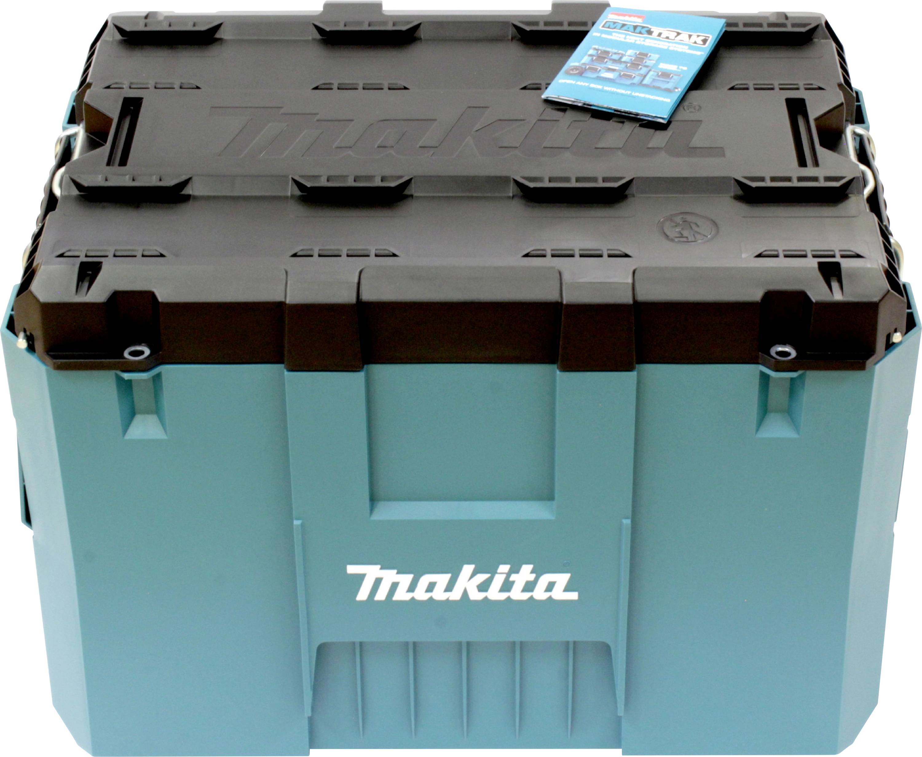 Blaue und schwarze Makita Werkzeug-Aufbewahrungsbox mit geschlossenem Deckel und einem kleinen Bedienungshandbuch darauf.