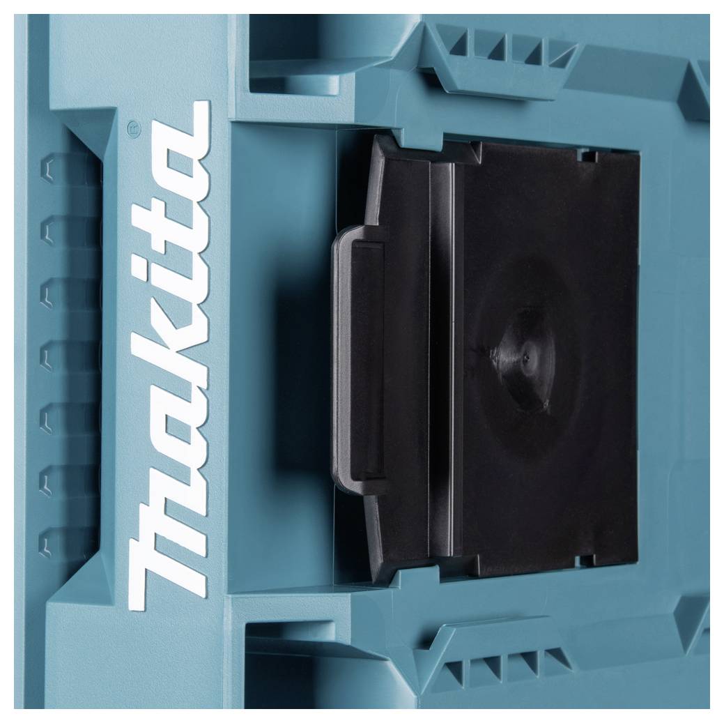 'Makita'-Logo auf einem blaugrünem Elektrowerkzeugkoffer mit schwarzem Griff.