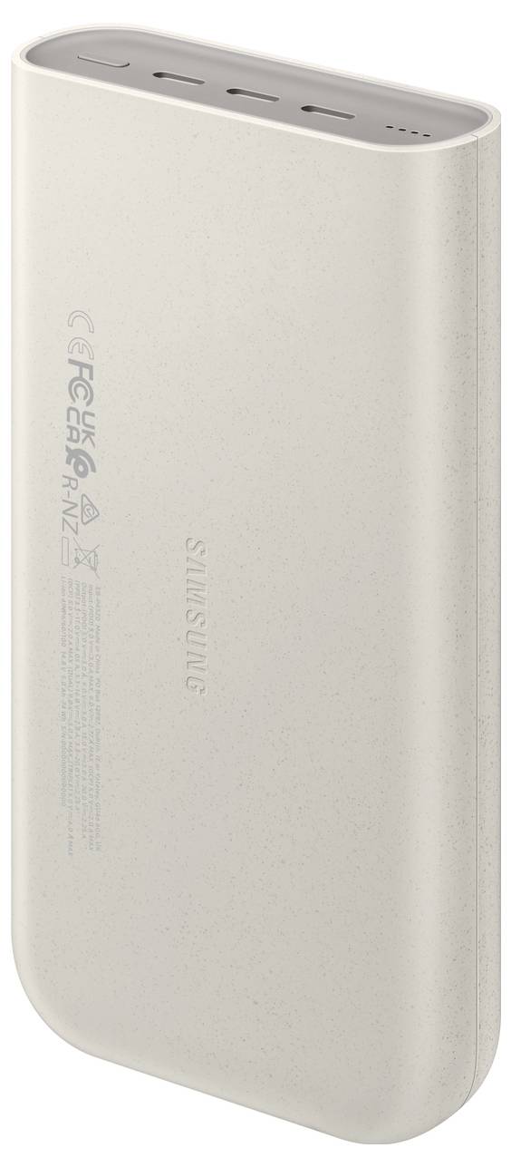 Ein beiges tragbares Powerbank mit rechteckiger Form, ausgestattet mit mehreren Ausgängen und einem Knopf an der oberen Kante.