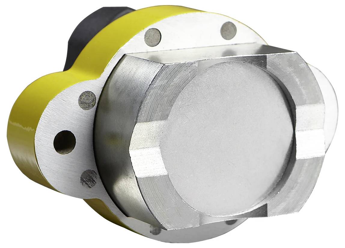 Industrielles Metallbauteil mit gelber Ummantelung und vorstehendem zylindrischen Profil, versehen mit Befestigungslöchern und einer glatten silbernen Oberfläche.