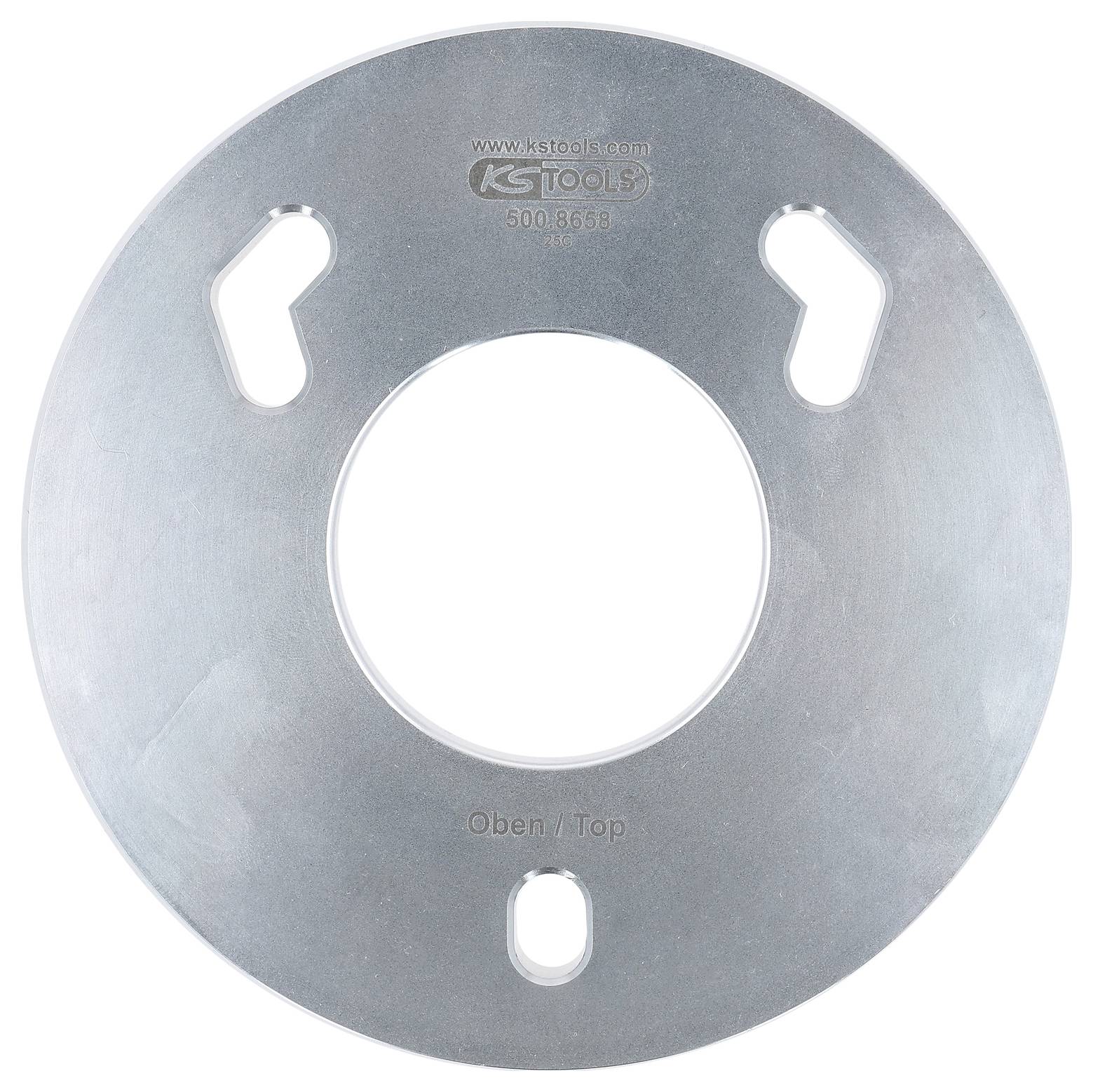 Silberfarbene Metalscheibe mit drei Schlüssellochöffnungen, beschriftet mit 'KS TOOLS', zentriert und graviert mit '500.8668', mit Markierung 'Oben / Top' am unteren Rand.