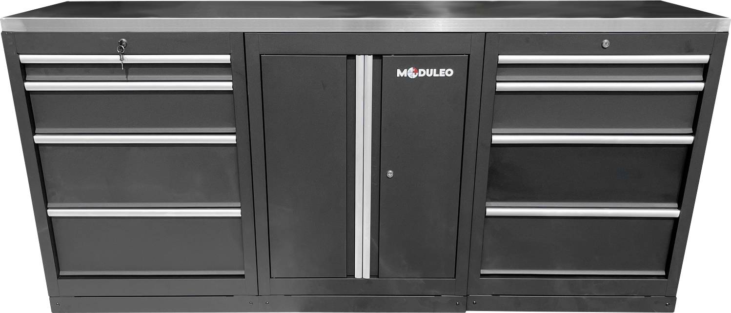 Eine schwarze Metallwerkzeugkiste mit zwei zentralen Türen, beschriftet mit 'MODULEO', flankiert von zwei vertikalen Säulen mit je drei Schubladen, auf einer silbernen Arbeitsfläche.