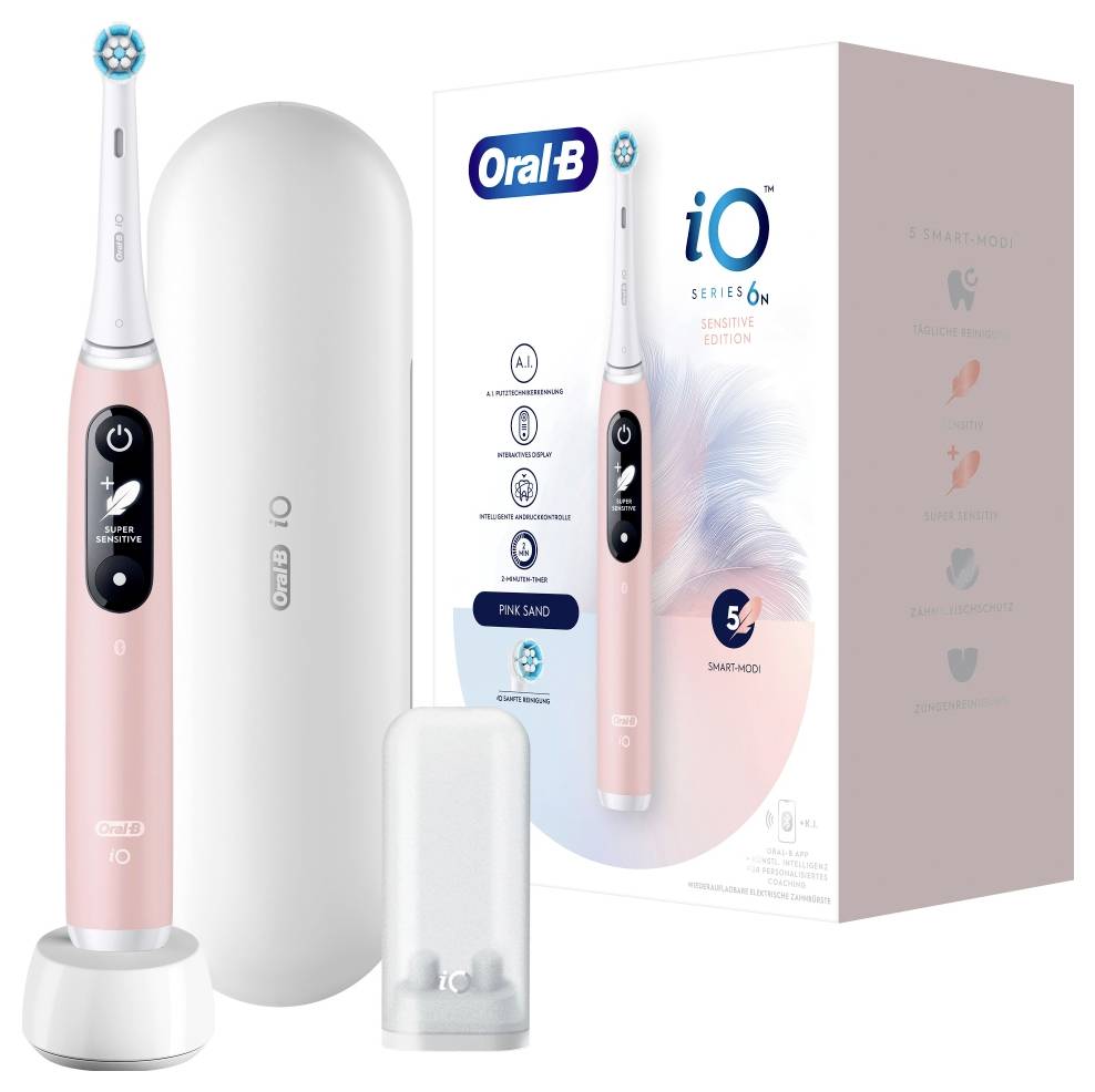 Oral-B iO Series 6 Elektrische Zahnbürste in Rosa umfasst Zahnbürste, Ladestation, zwei Aufsteckbürsten und Aufbewahrungsetui. Die Verpackung hebt 5 intelligente Modi hervor.