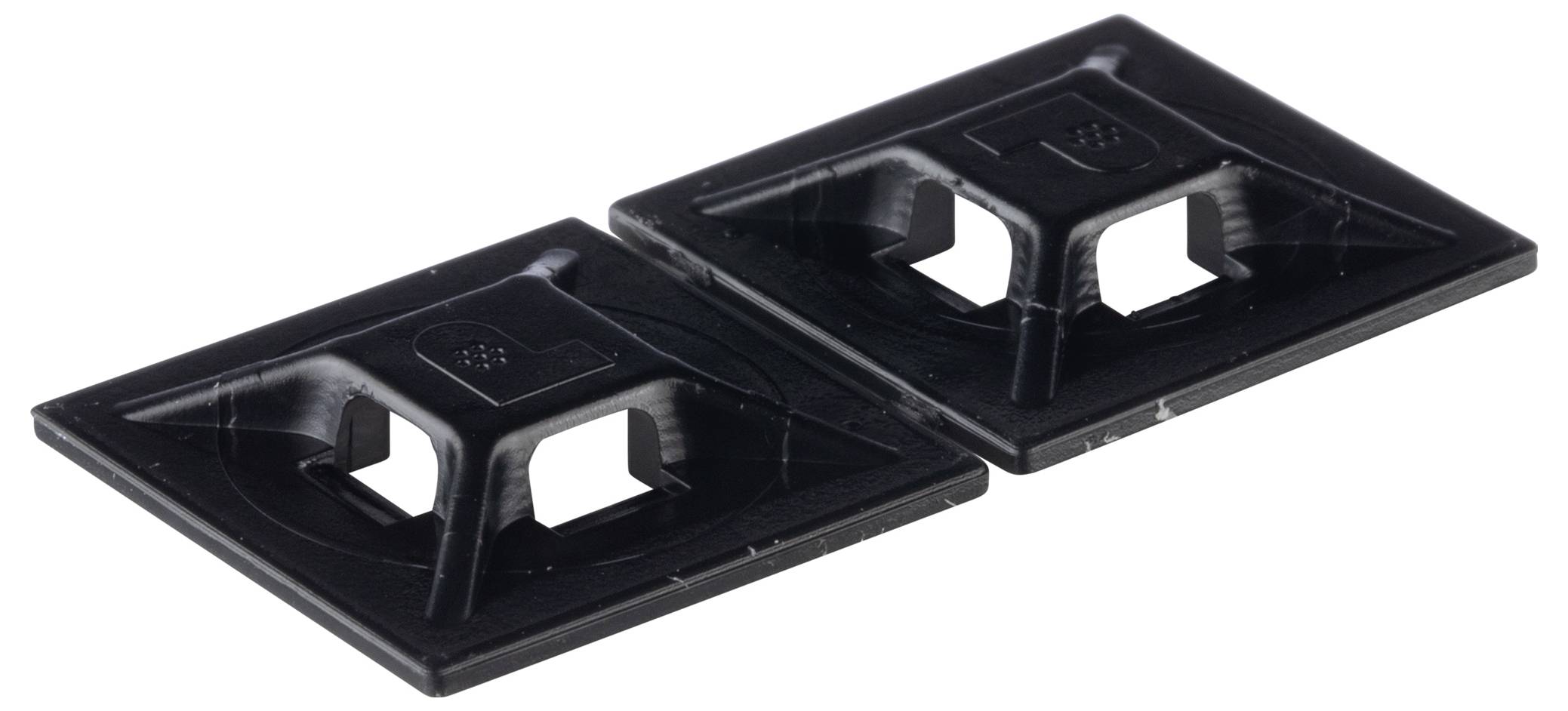 Zwei schwarze Kabelhalterungen in quadratischer Form mit Klebefläche, entwickelt zur Befestigung von Kabeln oder Leitungen auf ebenen Oberflächen.