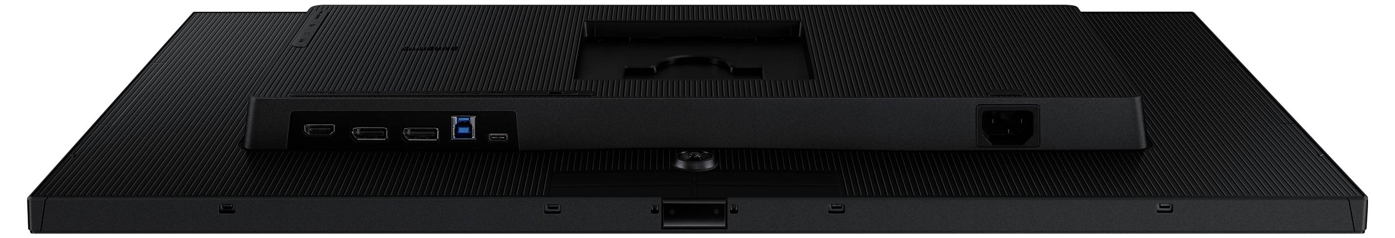 Rückansicht eines Monitors mit Anschlüssen wie HDMI und USB. Der Stromanschluss befindet sich auf der rechten Seite. Schwarze, strukturierte Oberfläche.