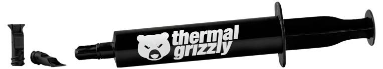Eine schwarze Spritze mit der Aufschrift "Thermal Grizzly" und einem wilden Bärenlogo, die zur Auftragung von Wärmeleitpaste auf Computerkomponenten verwendet wird.