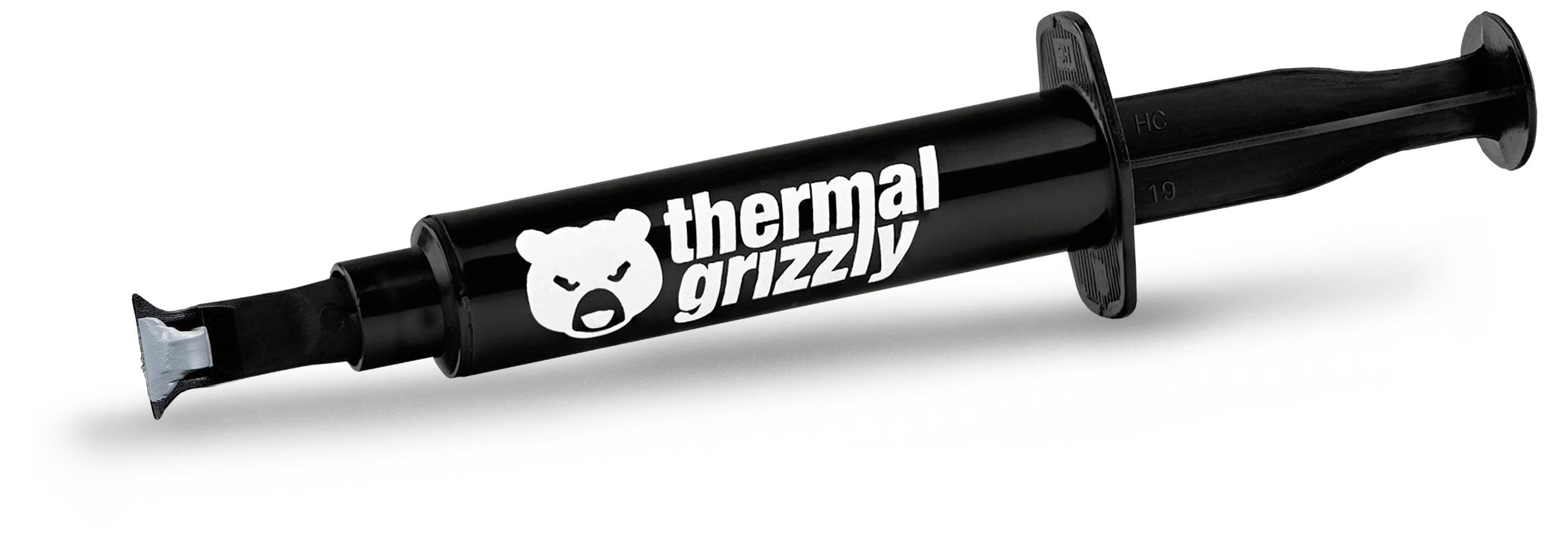 Schwarze Spritze mit dem 'Thermal Grizzly' Logo, entwickelt zum Auftragen von Wärmeleitpaste auf Computerkomponenten zur Verbesserung der Wärmeleitung.