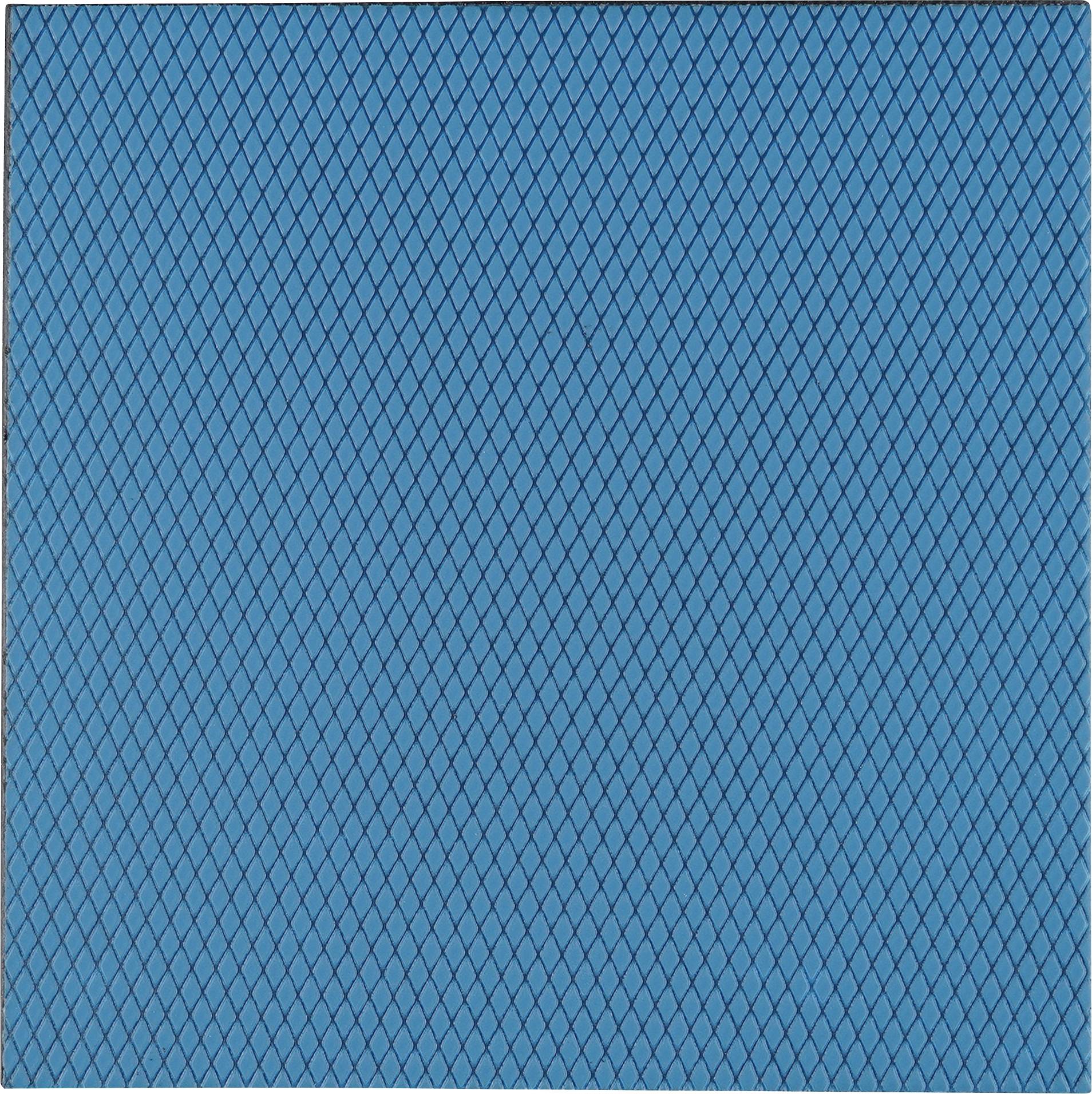 Eine strukturierte blaue Matte mit einem Rautenmuster, das die gesamte Oberfläche bedeckt.