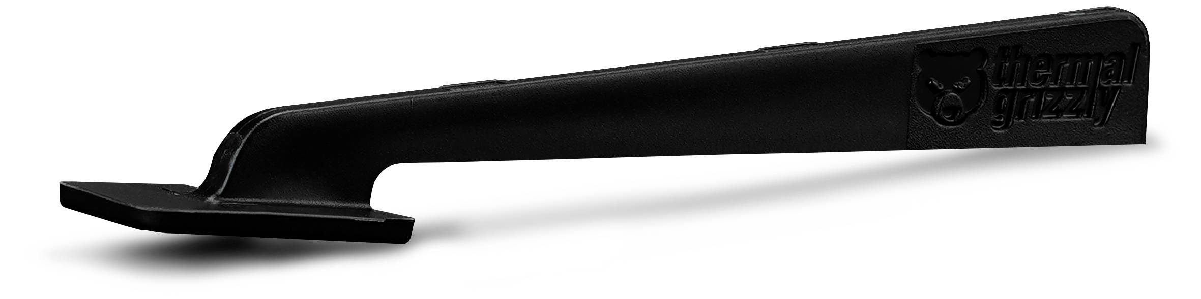 Ein schwarzer, angewinkelte Kunststoff-Applikator mit der Aufschrift 