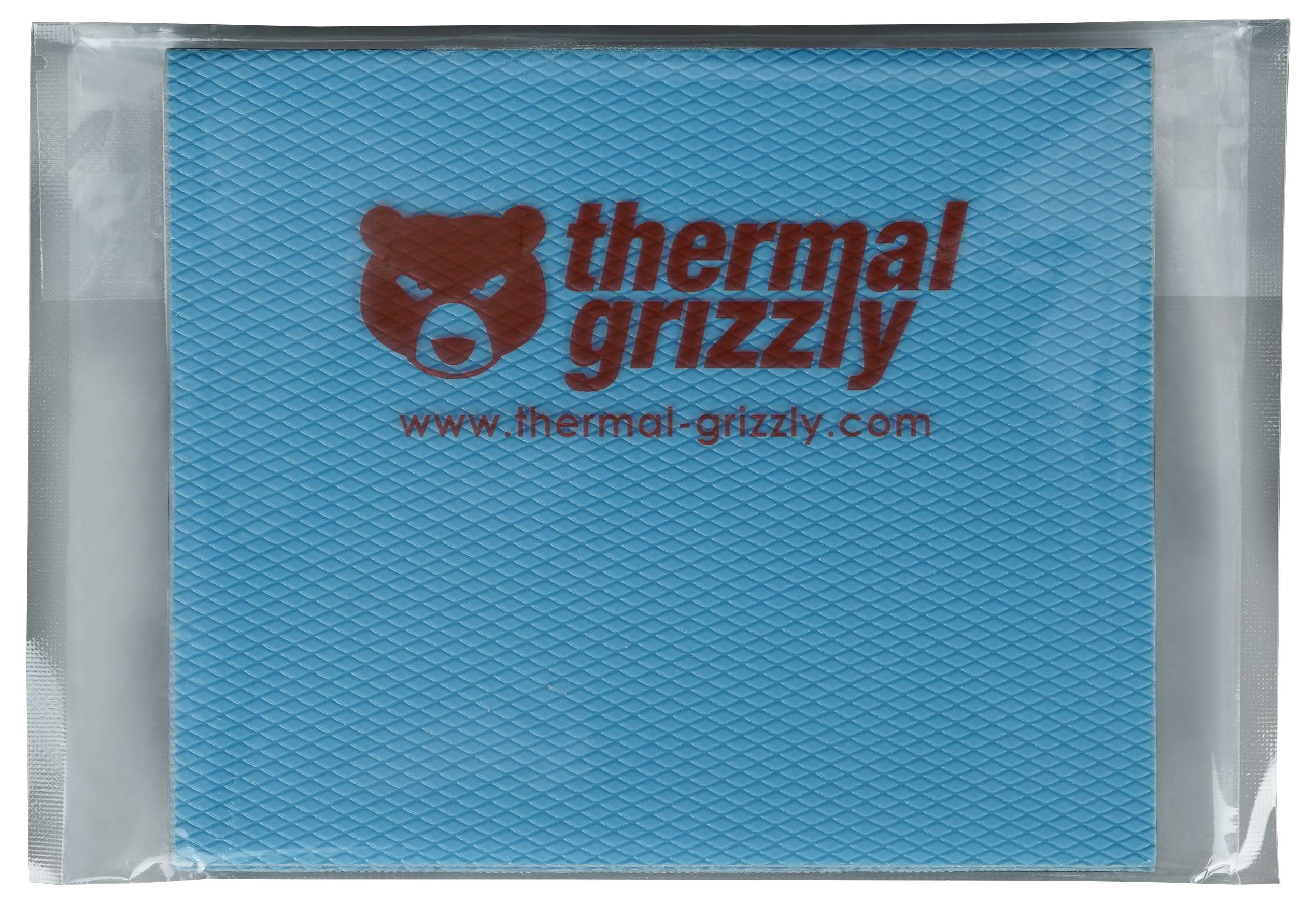 Eine blaue Wärmeleitpad von Thermal Grizzly in einer transparenten Verpackung, mit dem Markenlogo und der Webseiten-URL oben drauf.