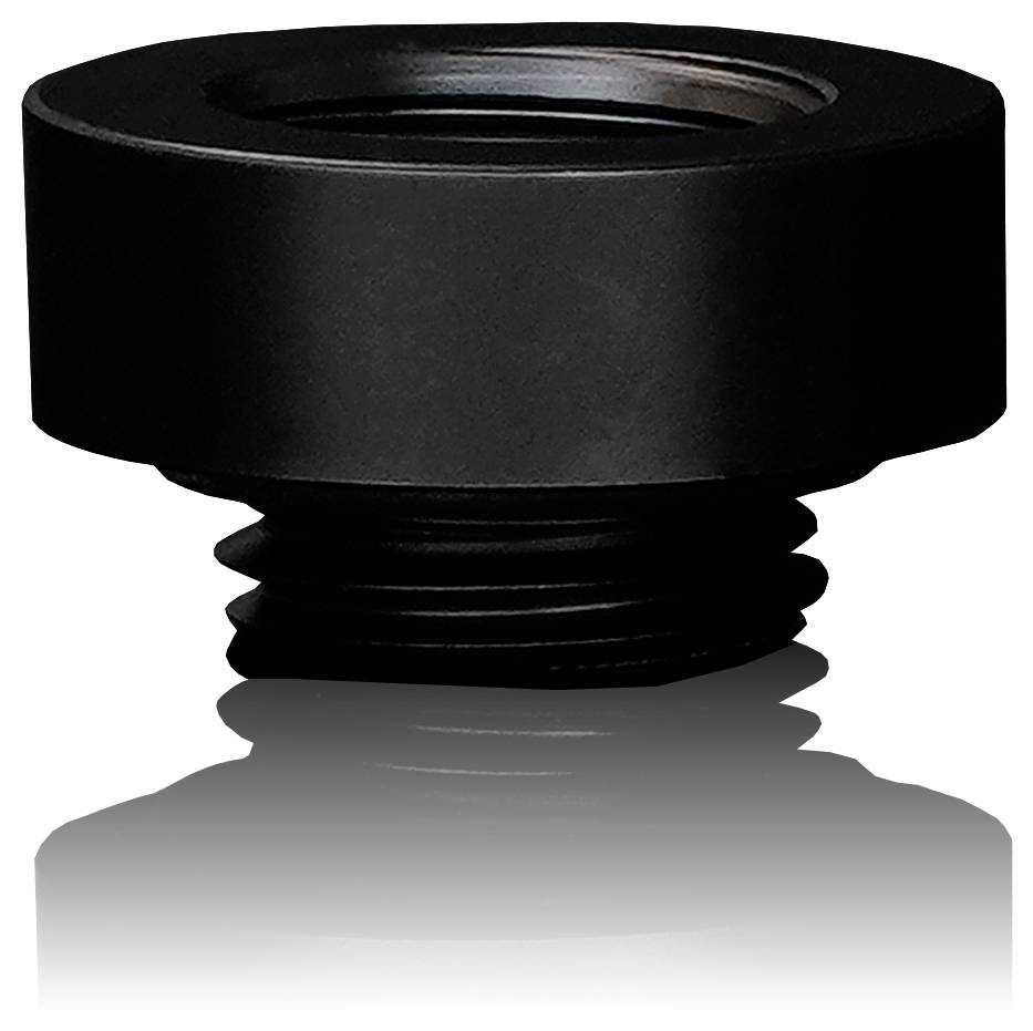 Ein schwarzer zylindrischer Objektivadapter mit Gewindeteilen, der sich auf einer glatten Oberfläche spiegelt.