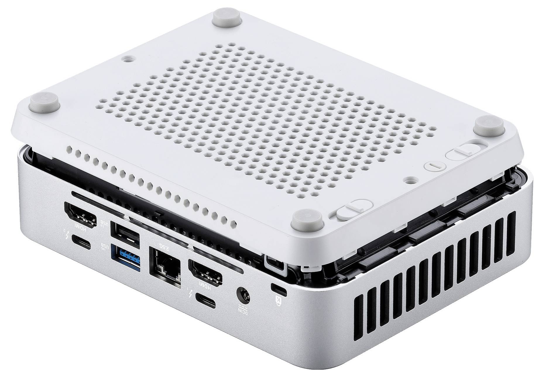 Ein kompaktes Computergerät mit gelochter Oberseite zur Belüftung. Ausgestattet mit verschiedenen Anschlüssen wie HDMI, USB und Ethernet für Konnektivität.