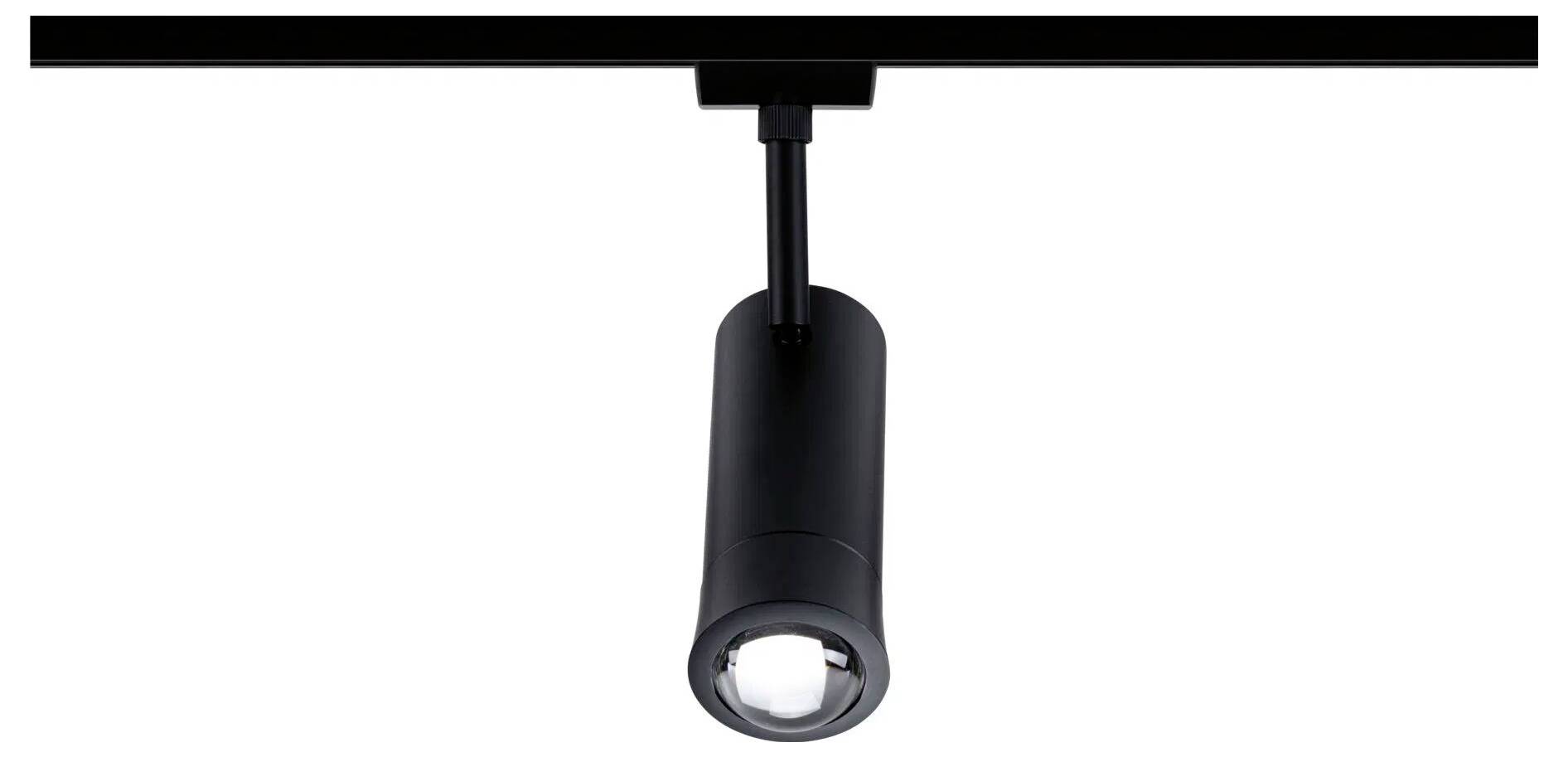 Eine schwarze Schienenbelechtung mit einer zylindrischen Lampeneinheit hängt von einer Schienenschiene, die für fokussierte Beleuchtung in Innenräumen verwendet wird.