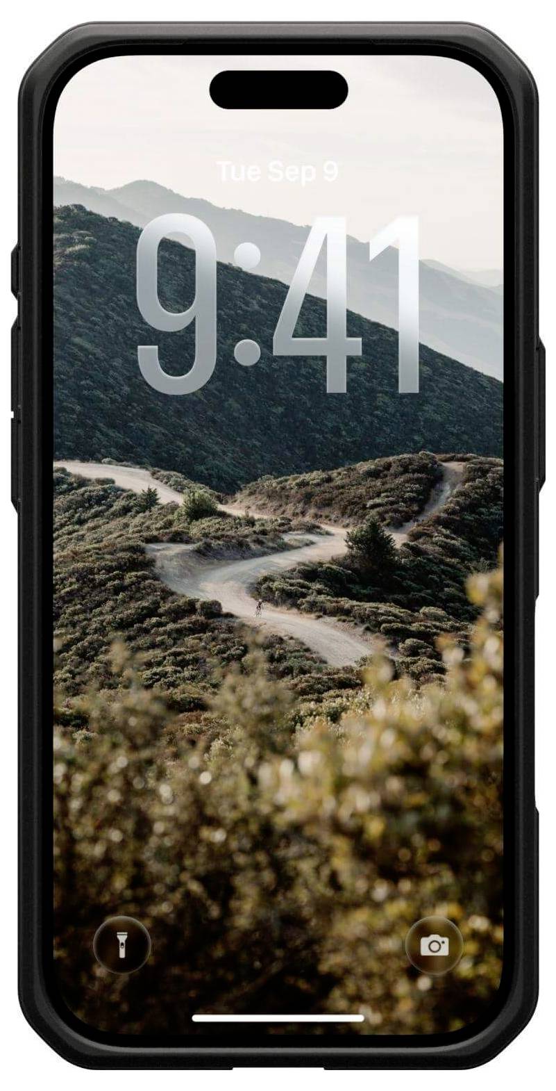 Ein Smartphone zeigt einen Sperrbildschirm mit der Zeit '9:41' und dem Datum 'Di, 9. Sep'. Im Hintergrund ist eine kurvenreiche Bergstraße unter einem klaren Himmel zu sehen.