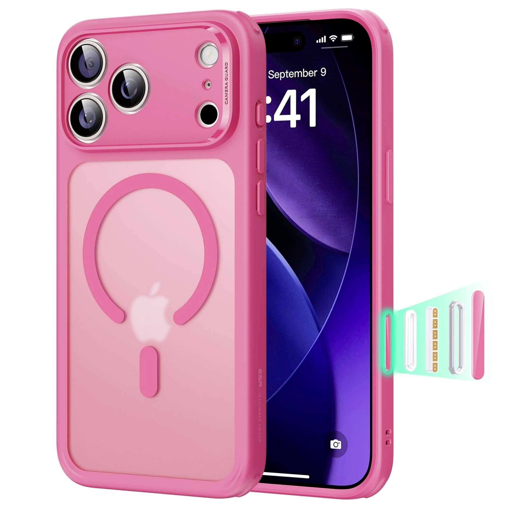 Ein rosa Telefon mit einer passenden Hülle, das ein kreisförmiges Design und drei Kameraobjektive aufweist, wird mit einem bunten Ständer in der Nähe gezeigt.