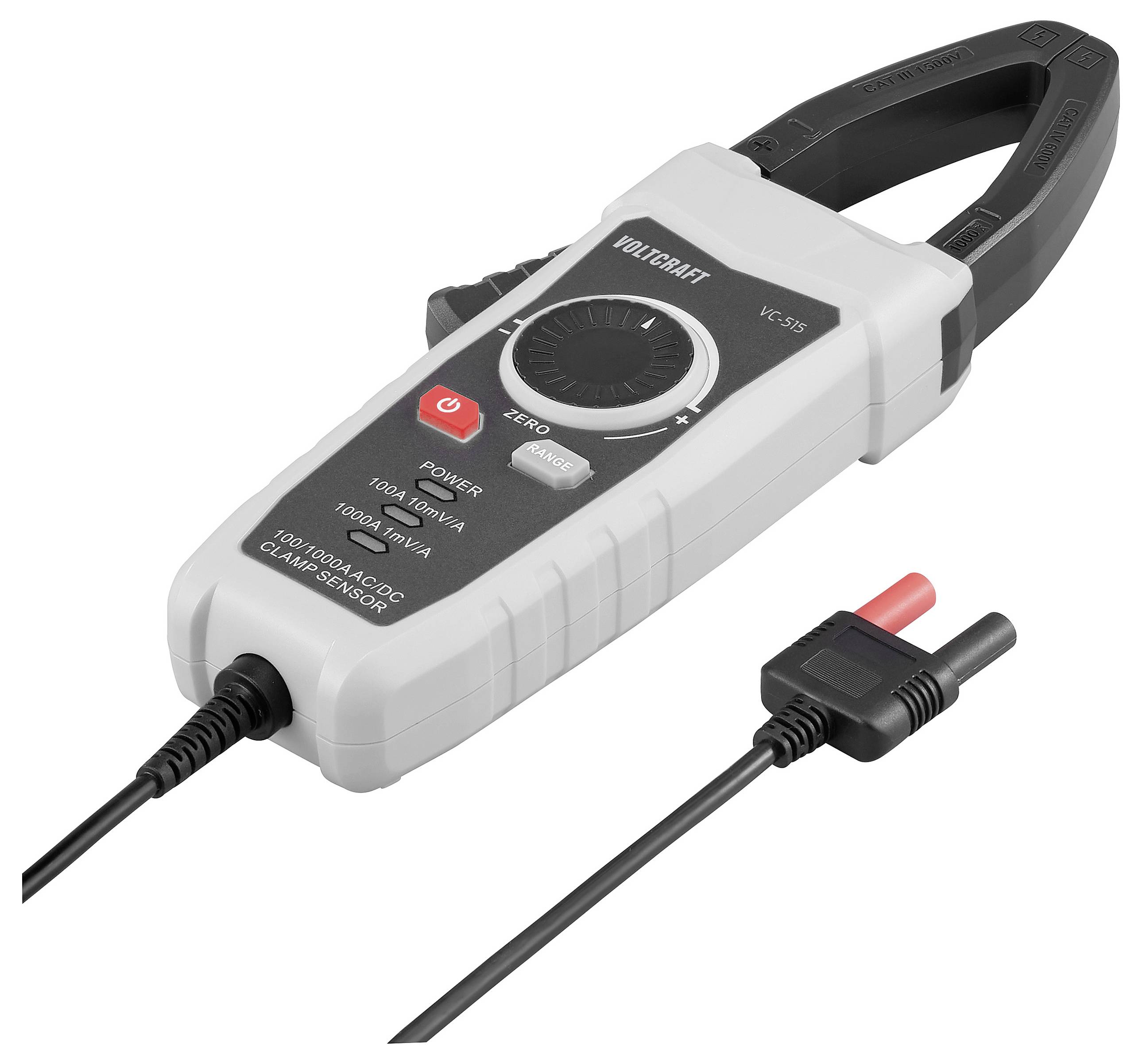 Handgehaltenes Zangenamperemeter mit geöffnetem Batteriefach, das zeigt, wo Batterien eingelegt werden. Daneben der Batteriedeckel mit Warnhinweisen.