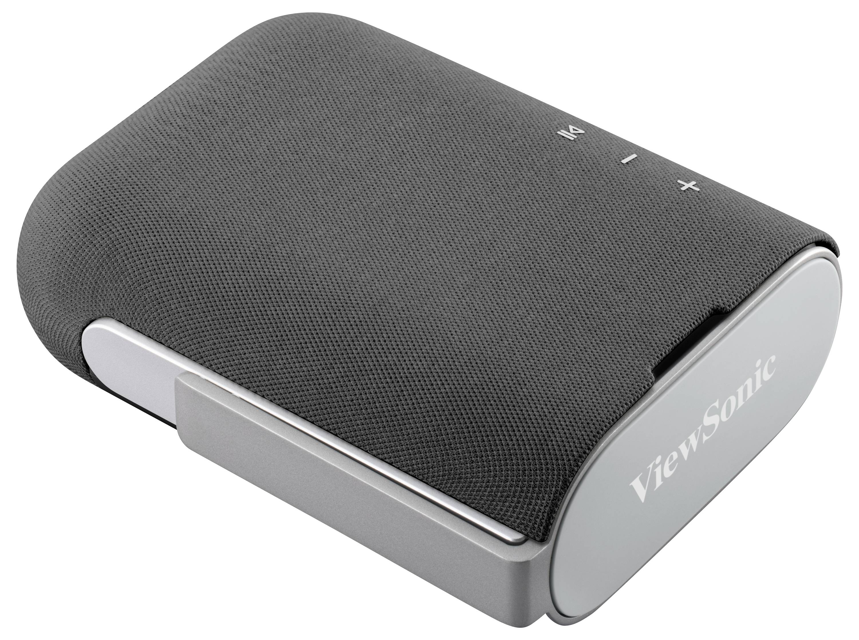 Ein kompakter, tragbarer Lautsprecher mit schwarzem Stoffbezug und silbernem Rand, ausgestattet mit Tastensteuerungen für Wiedergabe, Pause und Lautstärkeanpassung.