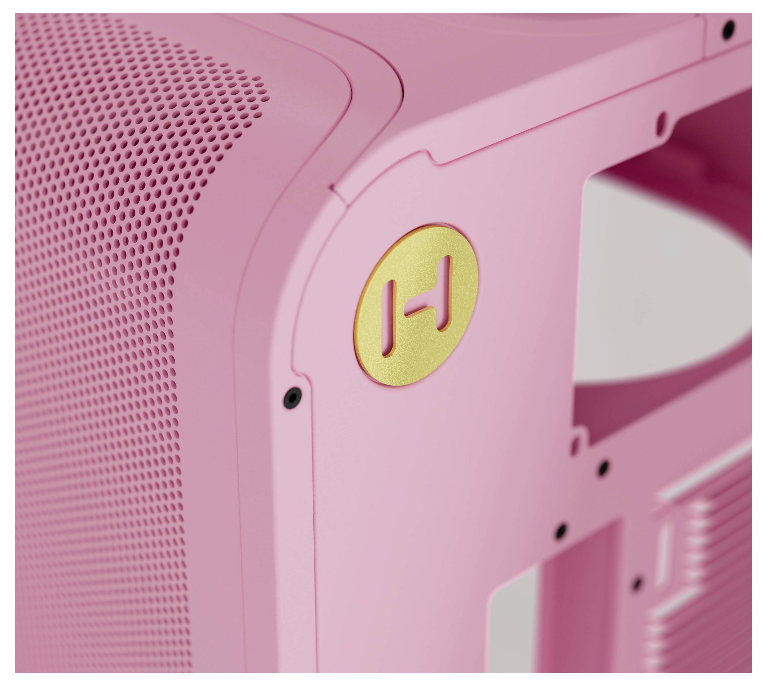 „Eine Nahaufnahme einer Ecke eines rosa Computergehäuses mit einem goldenen Kreis, der ein graviertes „H