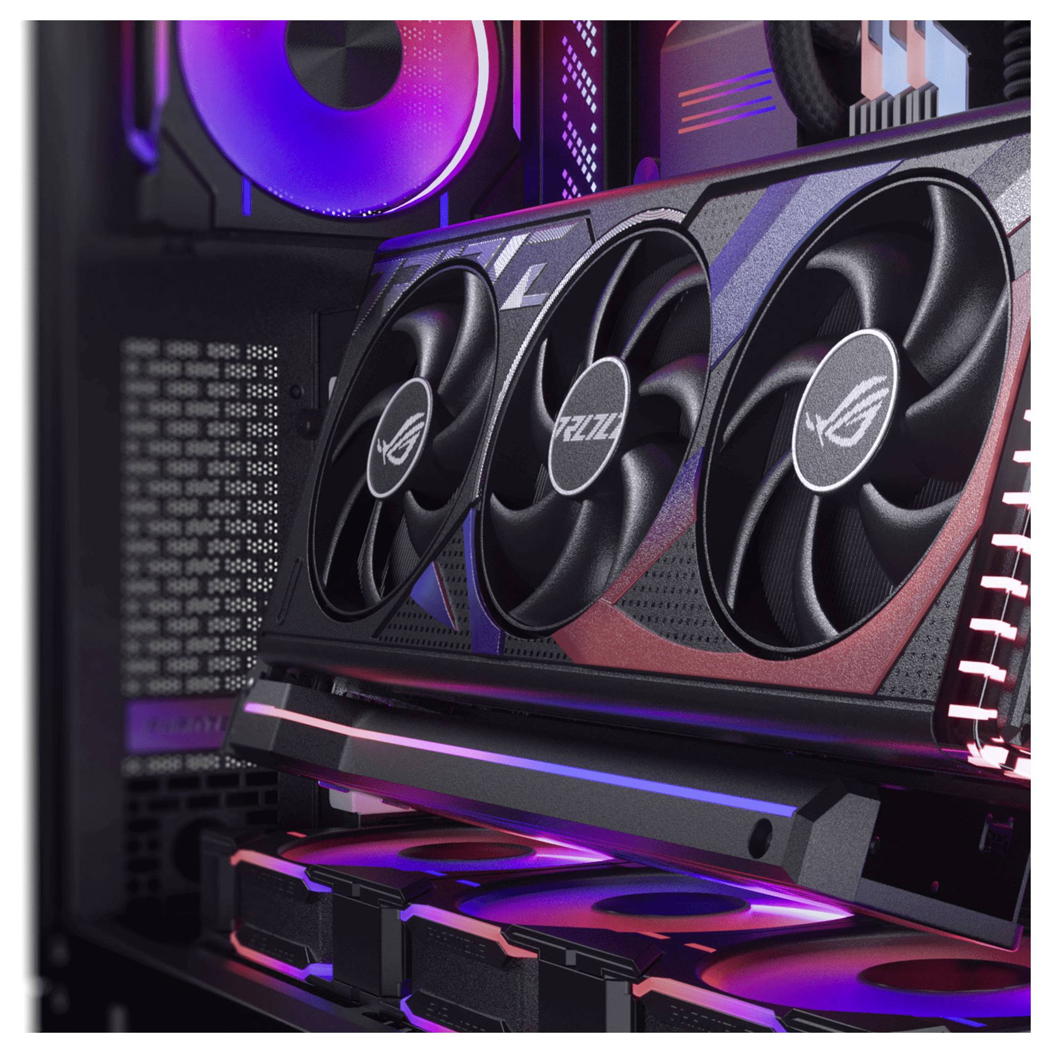 Ein Gaming-Computer-Setup mit einer hochleistungsfähigen Grafikkarte mit RGB-Beleuchtung und drei großen Kühlventilatoren in einem Tower-Gehäuse.