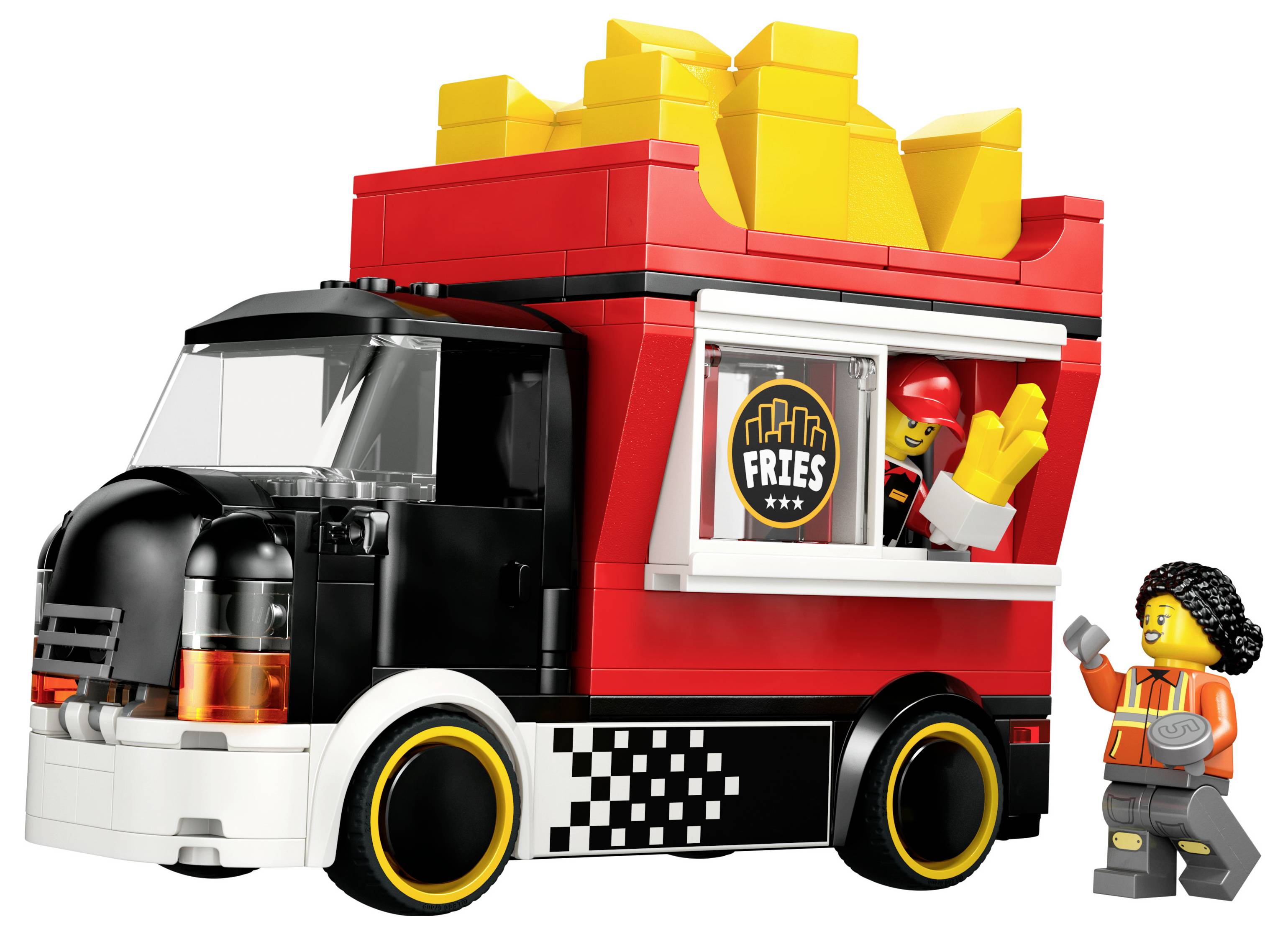 Ein Spielzeug-Foodtruck mit einer roten Pommes-Box auf dem Dach. Ein Verkäufer reicht einem Kunden Pommes durch das Fenster des Trucks. Der Truck hat ein 'Pommes'-Logo.