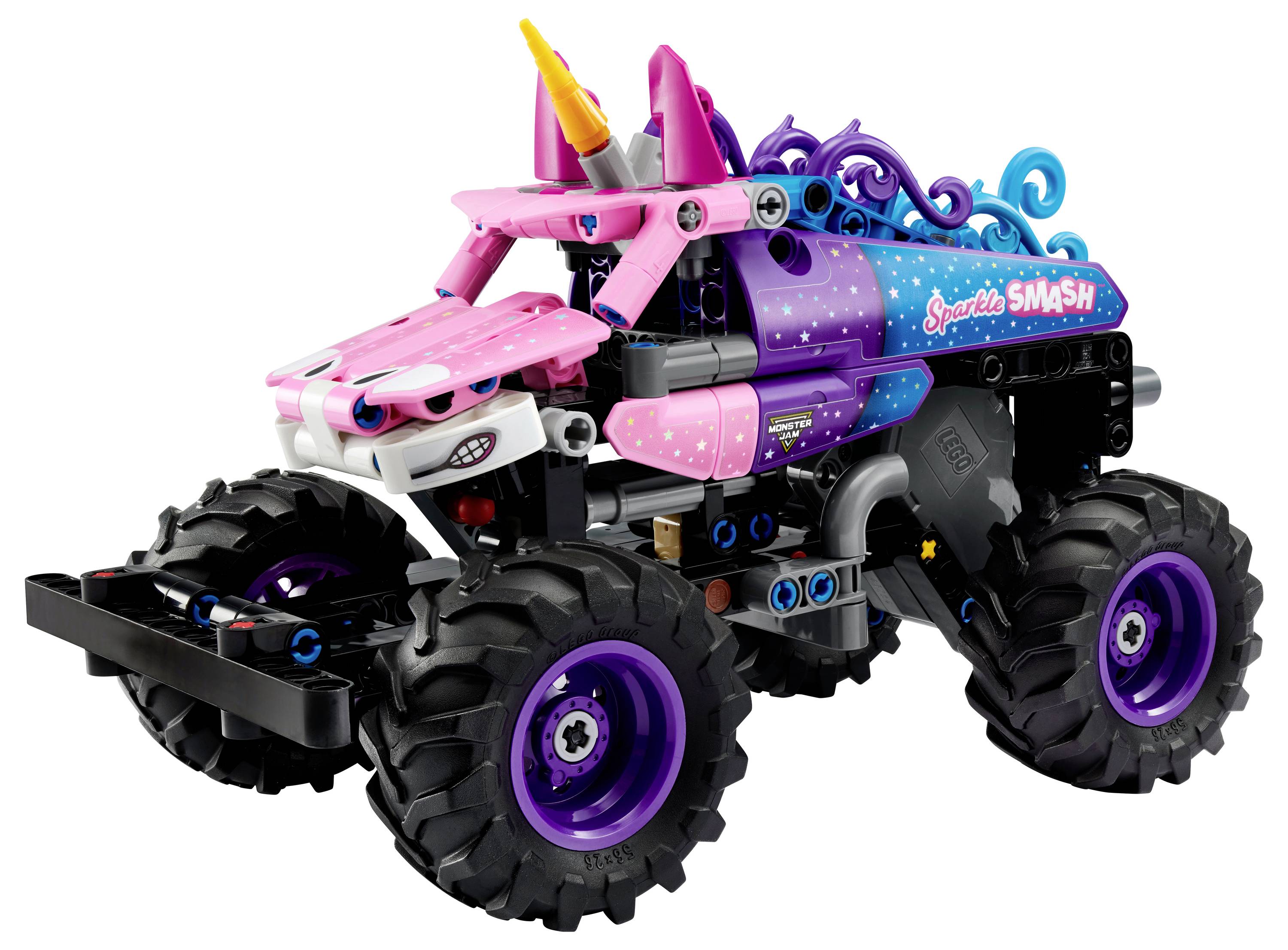 Ein Spielzeug-Monstertruck mit großen schwarzen Reifen, einem rosa und lila Karosseriebezug mit Wirbeln und einem Einhornnhorn an der Front.
