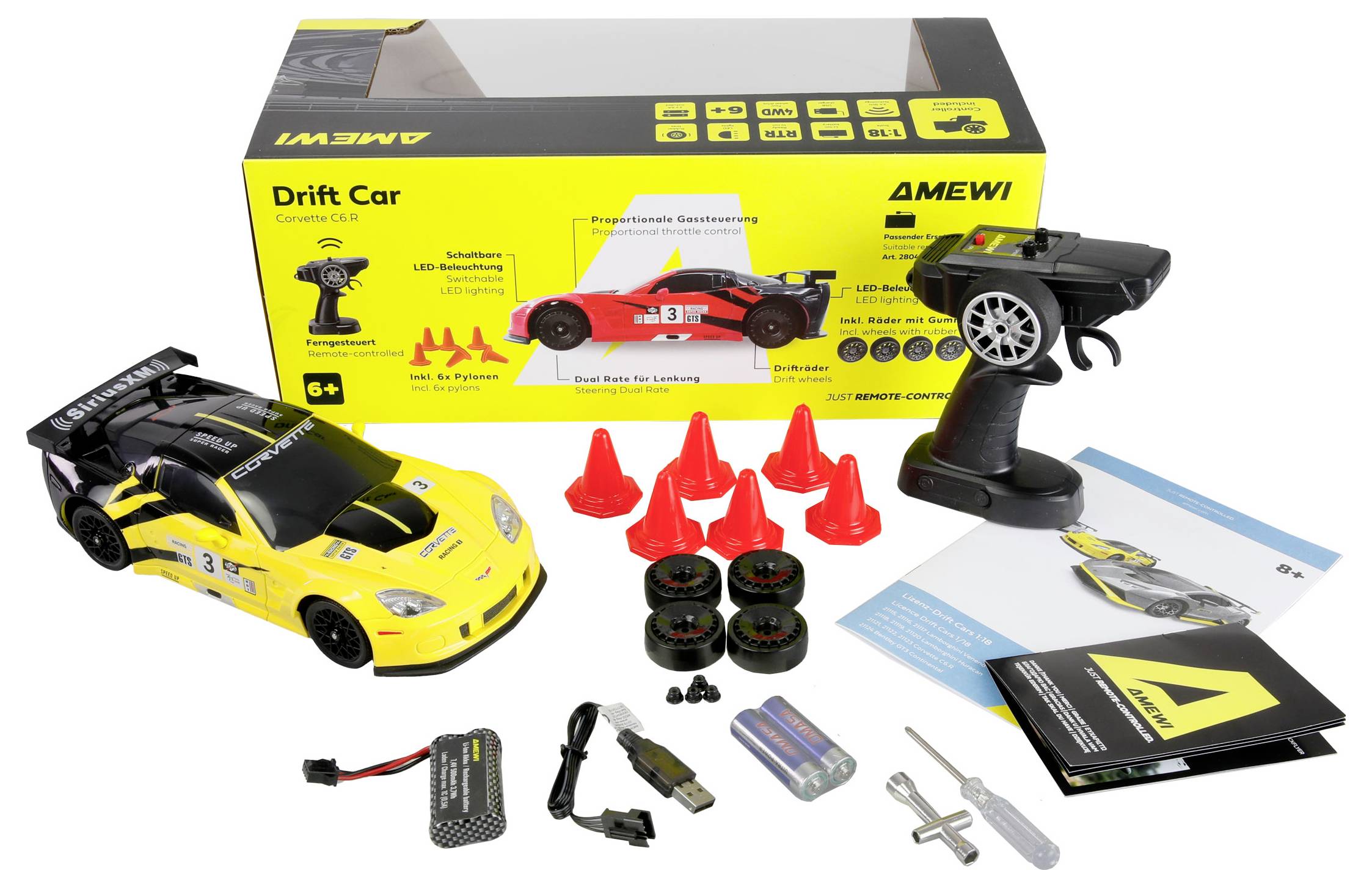 Ferngesteuertes gelbes Drift-Auto-Set enthält Auto, Fernbedienung, vier Ersatzreifen, acht Pylonen, Batterien, Ladegerät, Schraubendreher und Bedienungsanleitung.