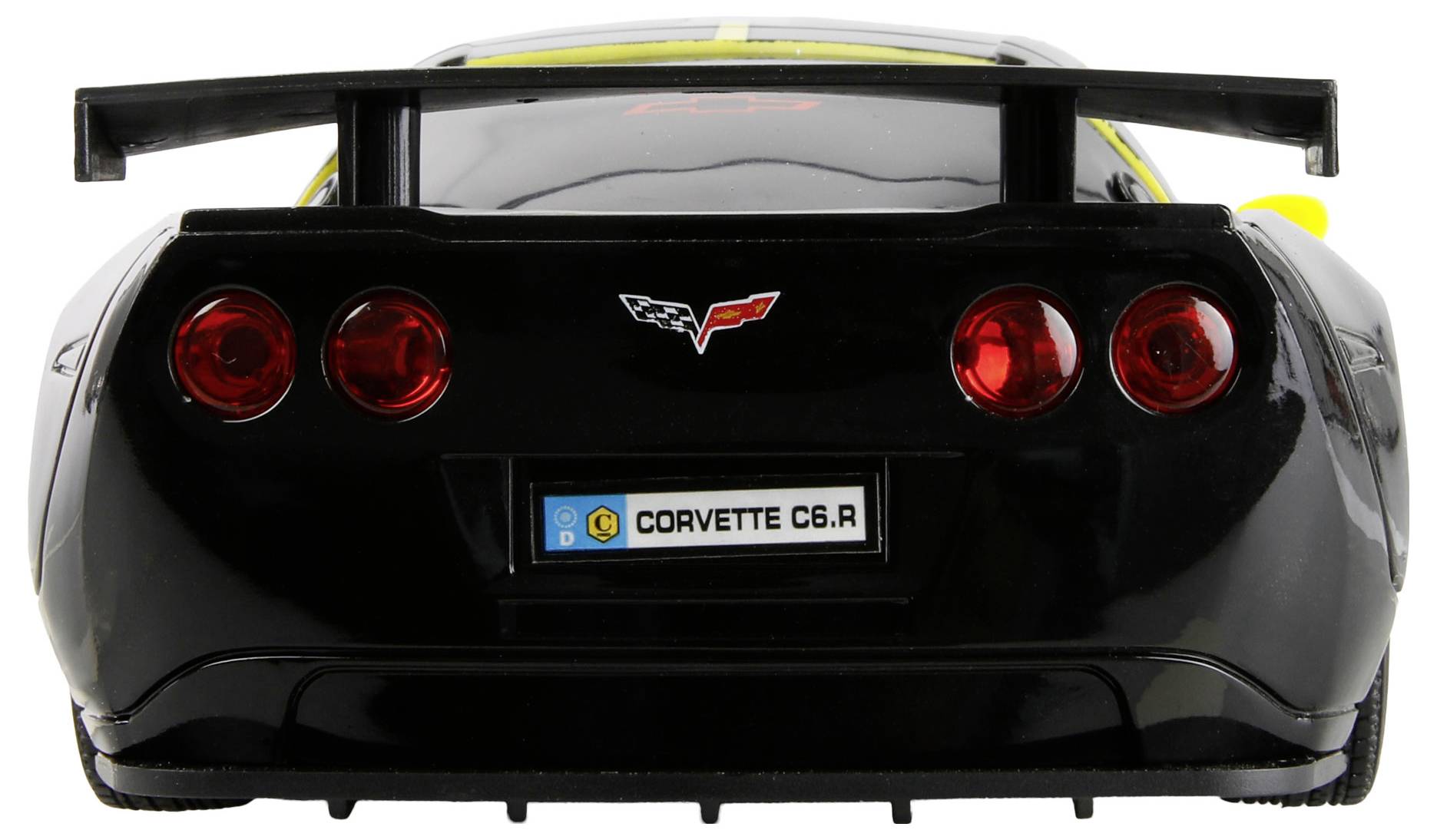 Das Bild zeigt die Rückansicht eines schwarzen Corvette C6.R Modellautos mit roten Rücklichtern und einem sichtbaren Nummernschild, auf dem 