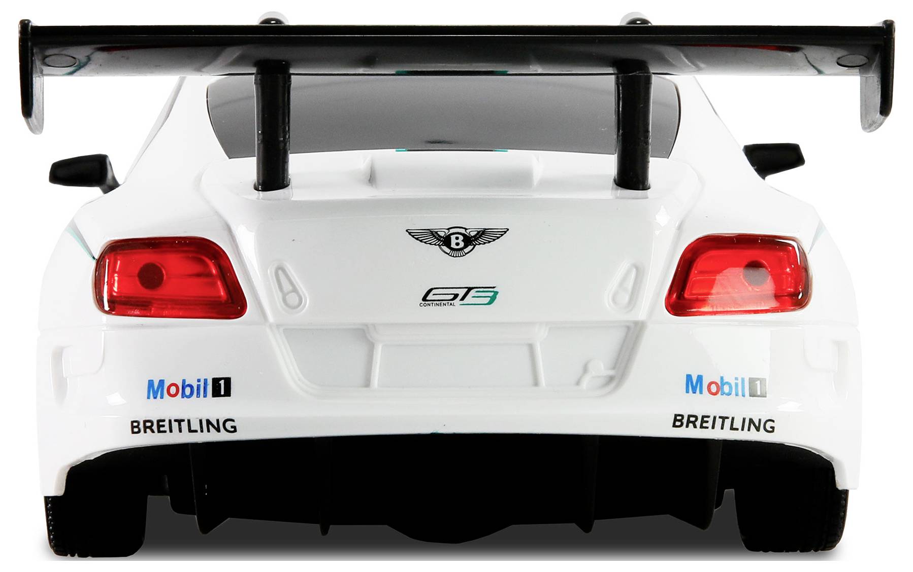 Ein weißes Rennauto mit Branding von 'Mobil 1' und 'Breitling', mit einem markanten Heckflügel und sichtbaren Logos, von hinten betrachtet.