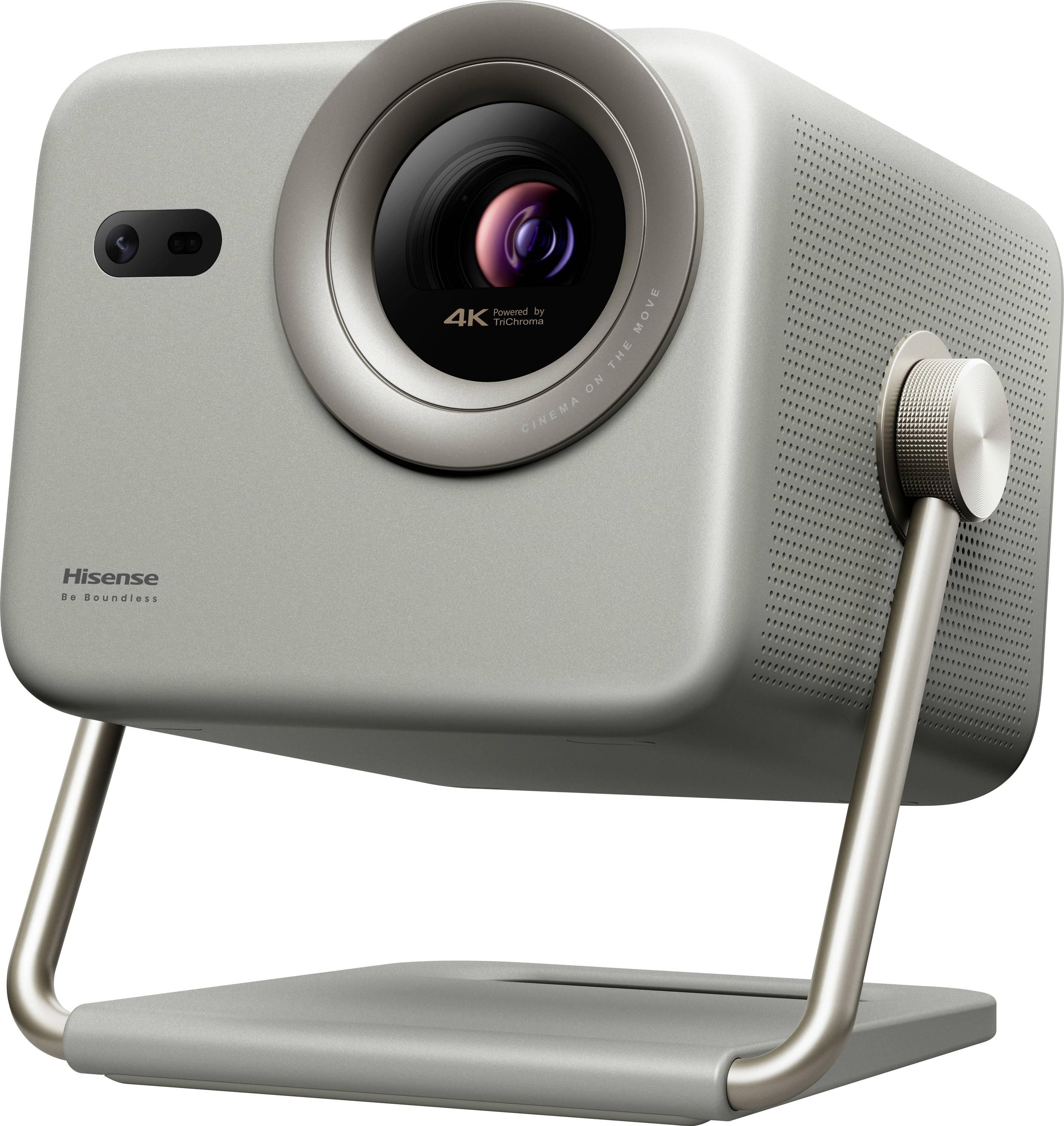 Ein moderner, kubusförmiger Projektor mit einer markanten Linse und verstellbarem Ständer. Das Gerät ist mit '4K Front Ultra Short Throw Laser' beschriftet.