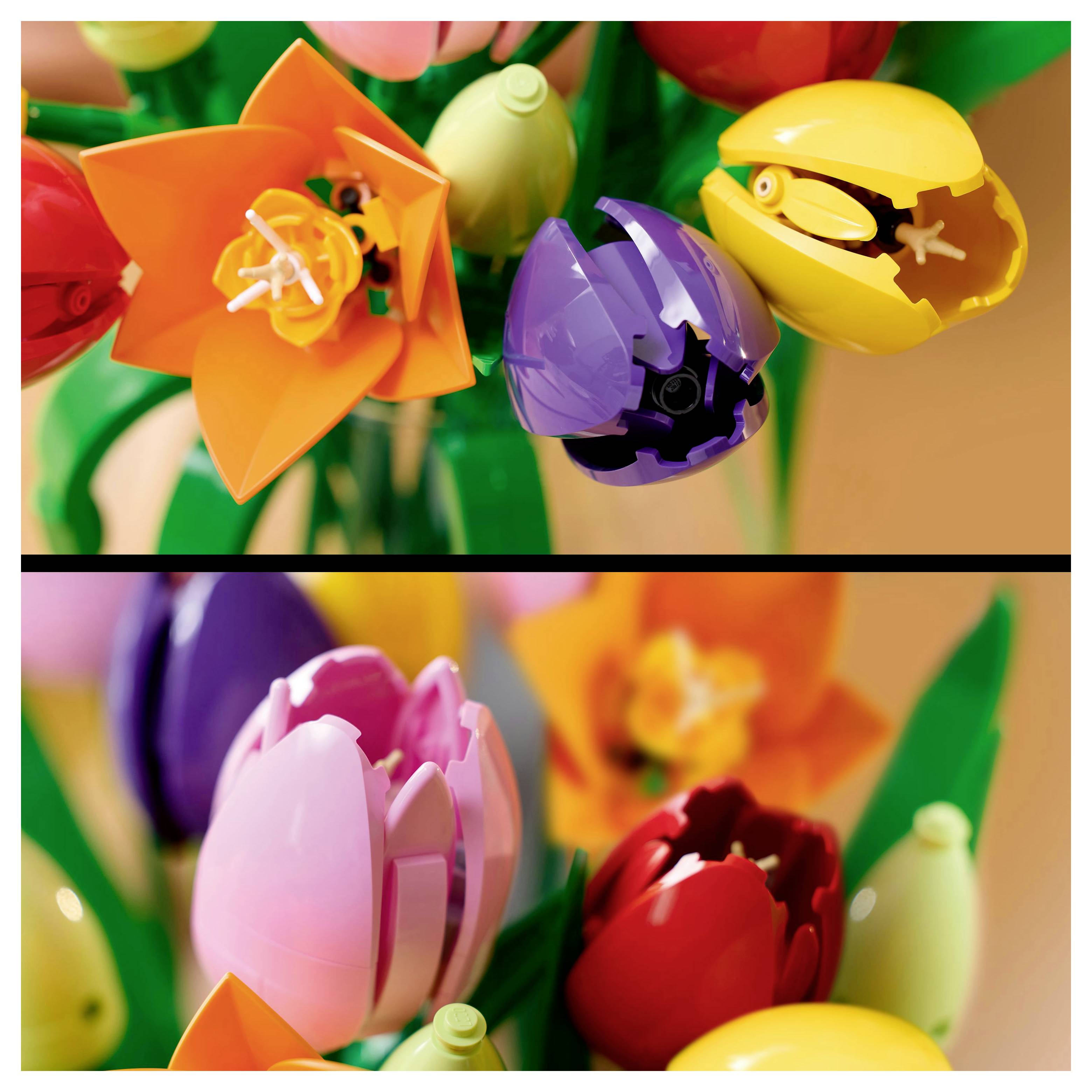 Lego-Blumen in leuchtenden Farben, darunter Orange, Lila, Rosa und Rot, zu einem Blumenstrauß arrangiert.