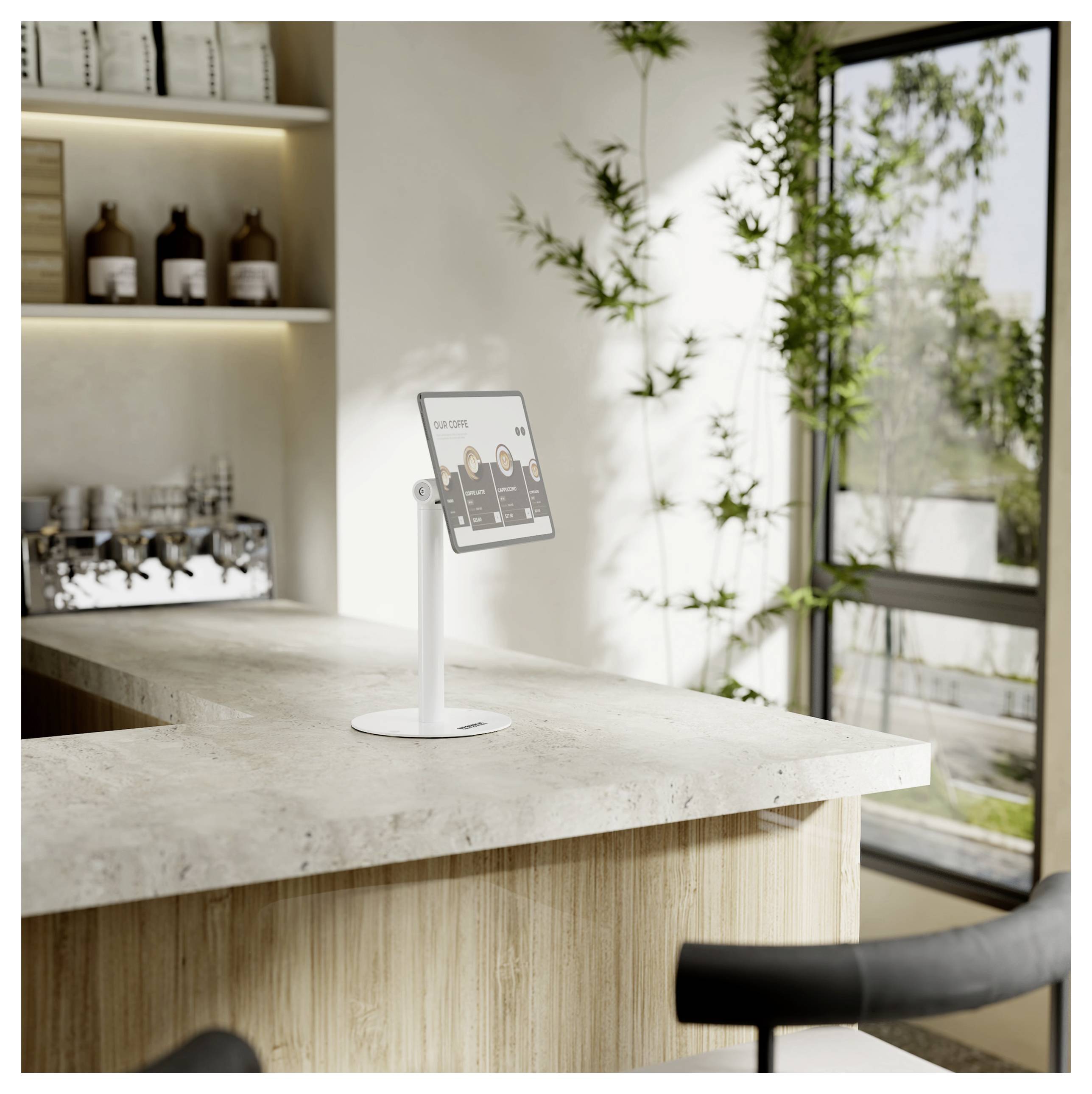 Eine elegante, moderne Küche mit einer L-förmigen Arbeitsplatte, Pflanzen am Fenster und einem digitalen Tablet auf der Arbeitsplatte, auf dem „Square