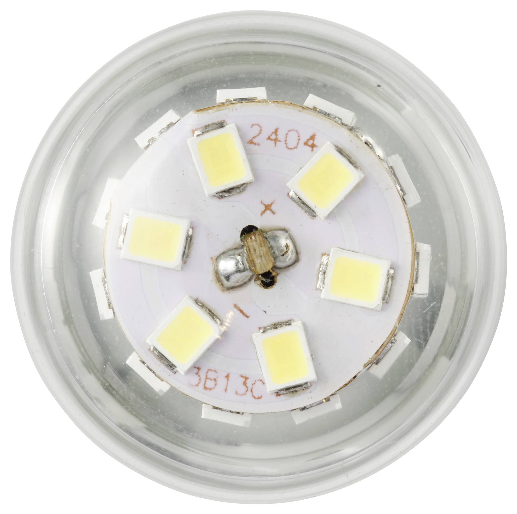 Draufsicht einer kreisförmigen LED-Lichtkomponente mit sechs rechteckigen LED-Chips, die um einen zentralen Punkt in einem Kunststoffgehäuse angeordnet sind.