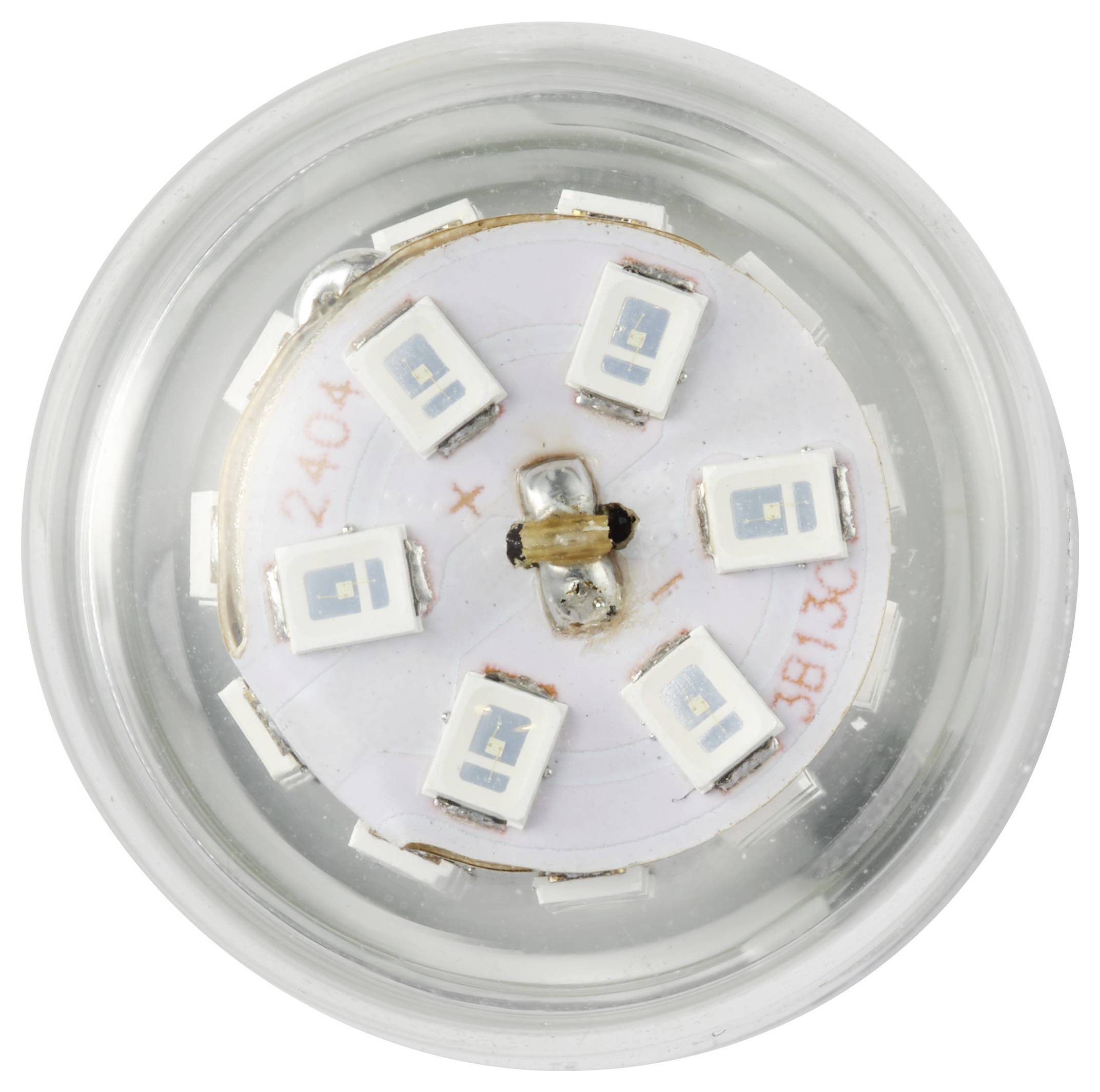 Eine Draufsicht auf einen LED-Cluster in einem transparenten kreisförmigen Gehäuse, der sechs gleichmäßig um eine zentrale Achse angeordnete LED-Chips zeigt.