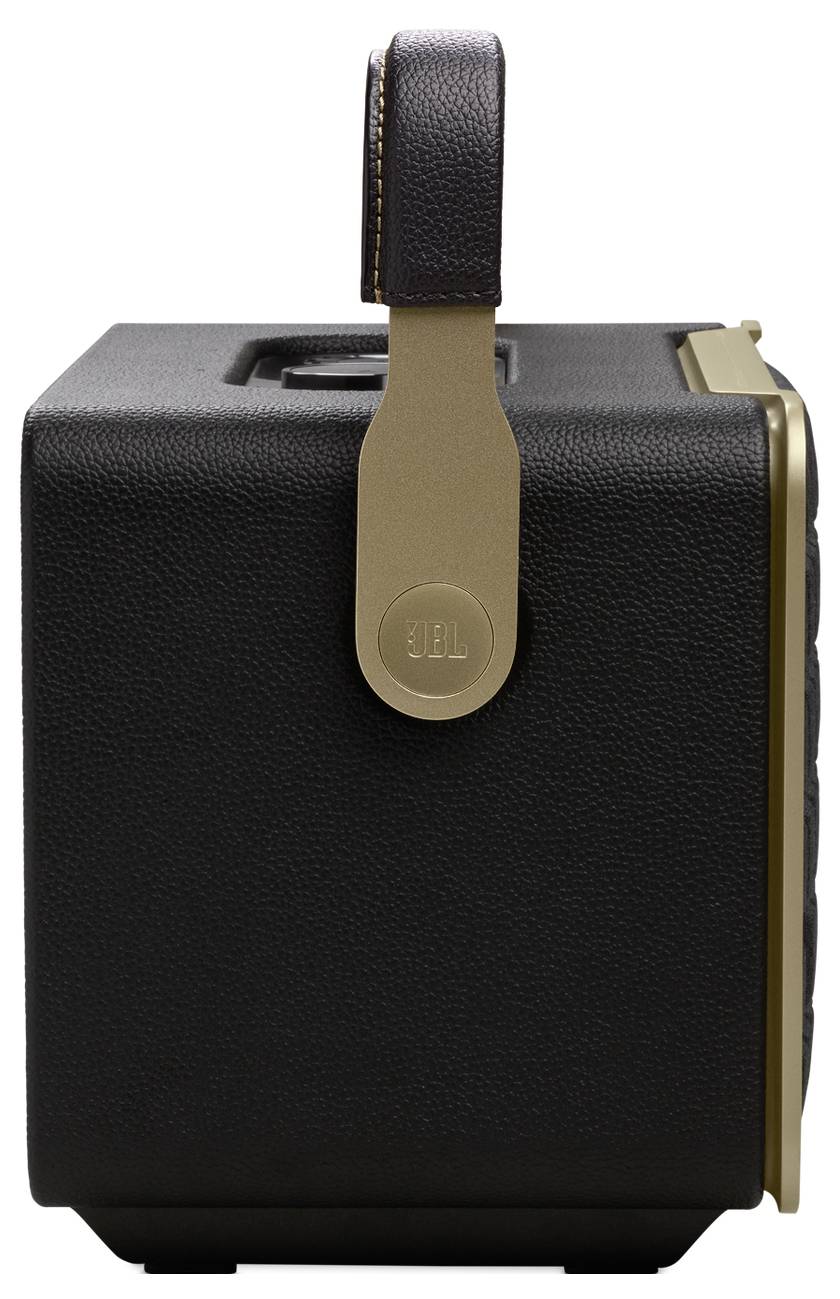 Ein kompakter schwarzer Lautsprecher mit Ledergriff, Goldakzenten und Bedienungstasten auf der Oberseite, entwickelt für mobile Audionutzung.
