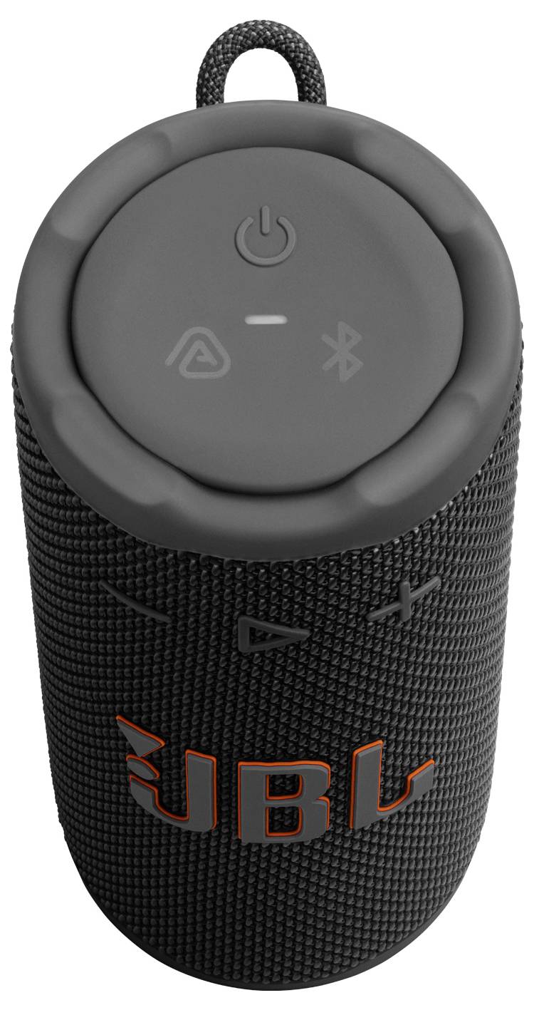 Ein schwarzer zylindrischer Bluetooth-Lautsprecher mit Energie- und Bluetooth-Symbolen auf der Oberseite, strukturierter Oberfläche und orangefarbenem 'JBL'-Logo an der Seite.