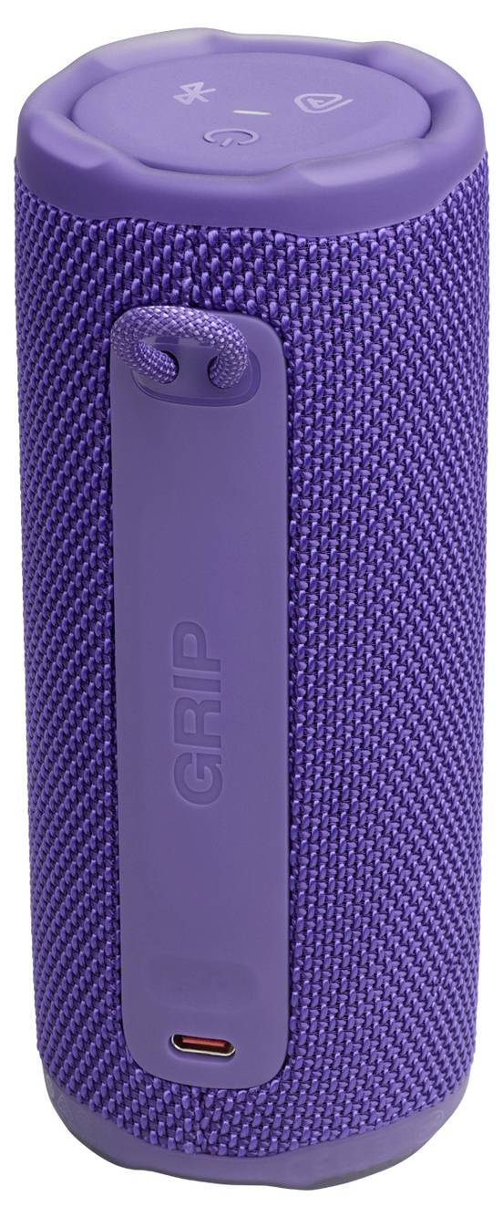 Ein lila zylindischer Bluetooth-Lautsprecher mit Stoffstruktur und Tragegriff.