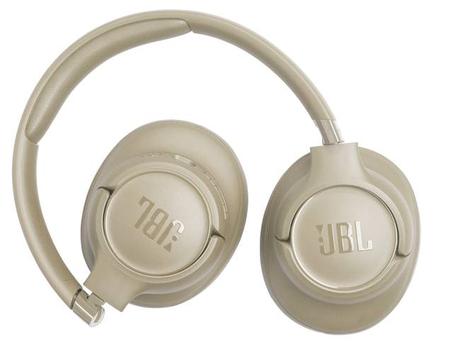 Kabellose Over-Ear-Kopfhörer in Beige-Farbe mit JBL-Logo, von oben fotografiert mit sichtbaren Ohrmuscheln und Kopfbügel.